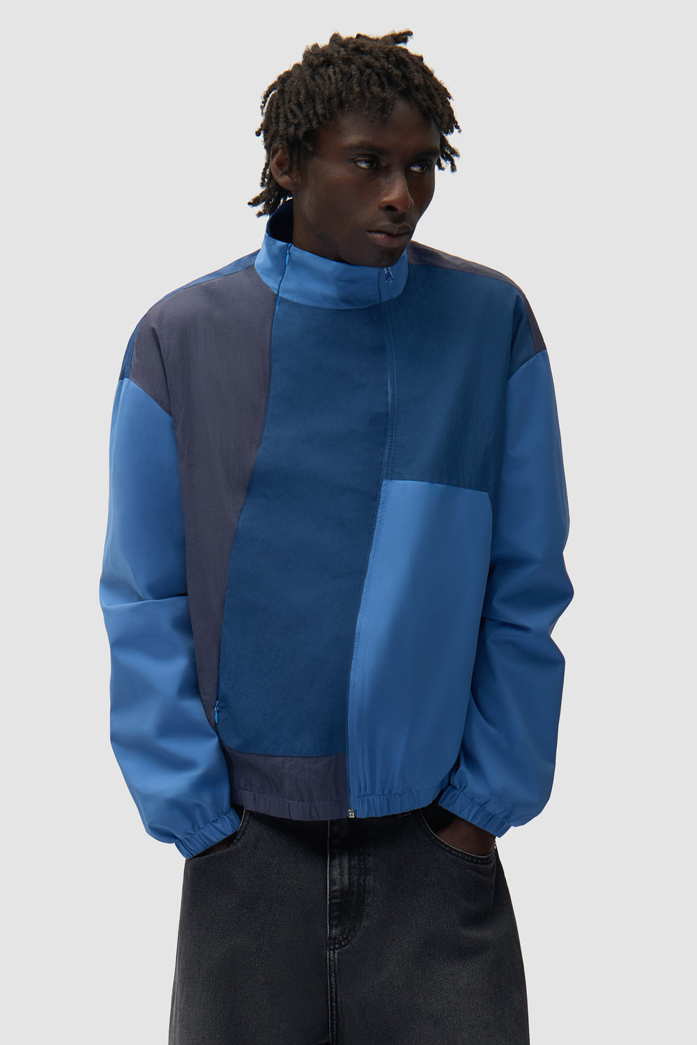 Veste à fermeture éclair incurvée - Bleue