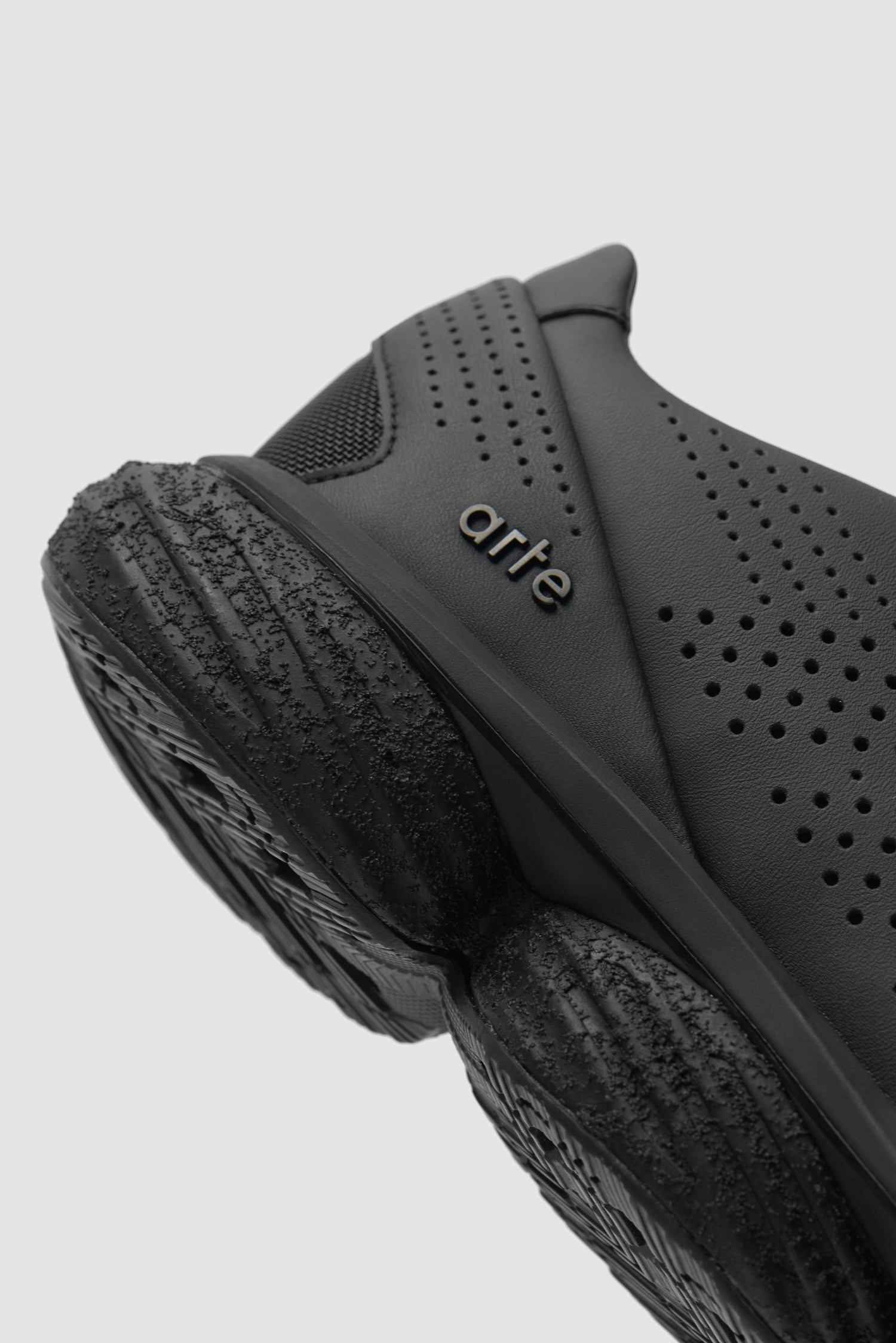 Arte pour adidas LB POD en Core Black, vue détaillée montrant le logo au talon