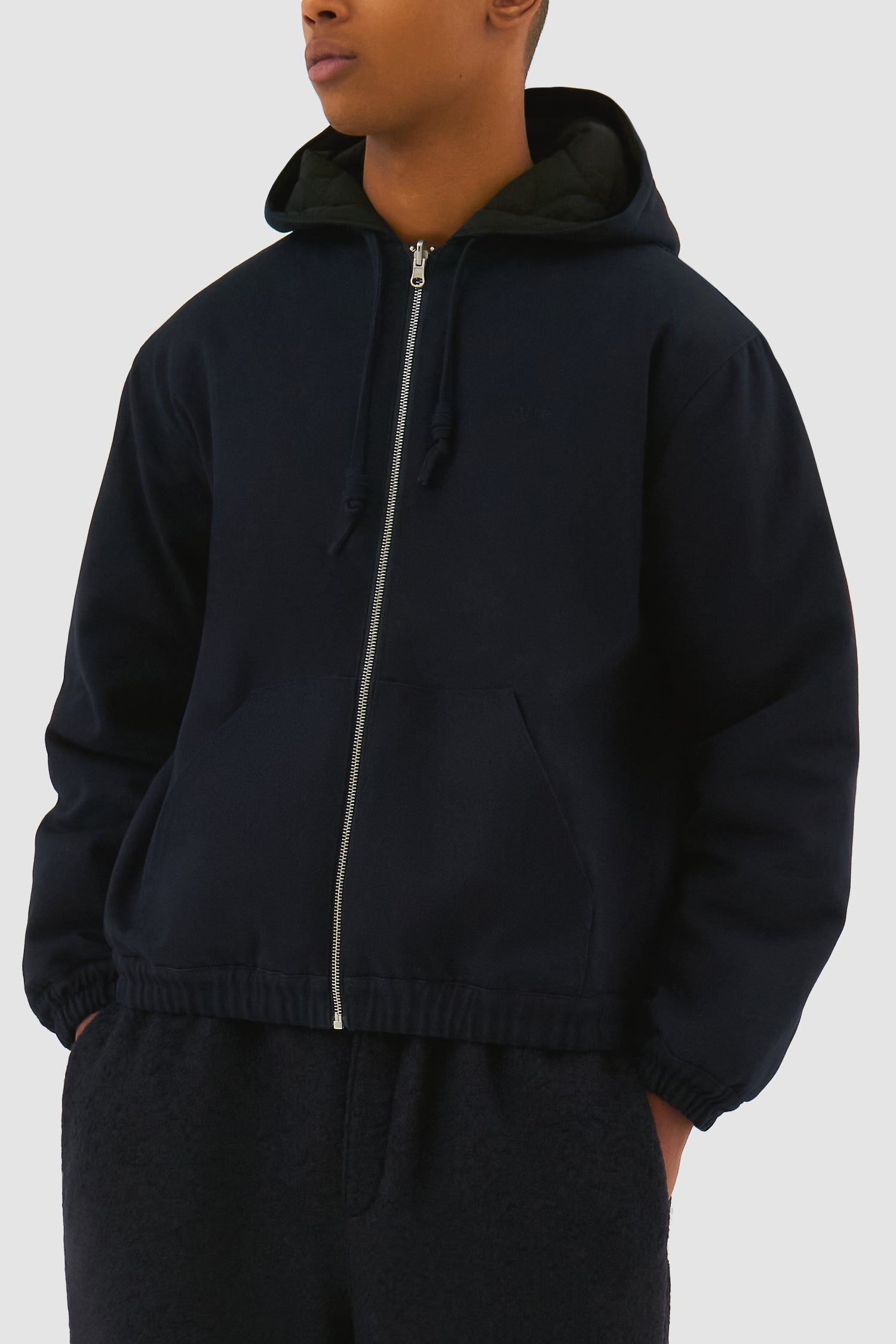Detail view of Reversible Hooded Jacket in Navy