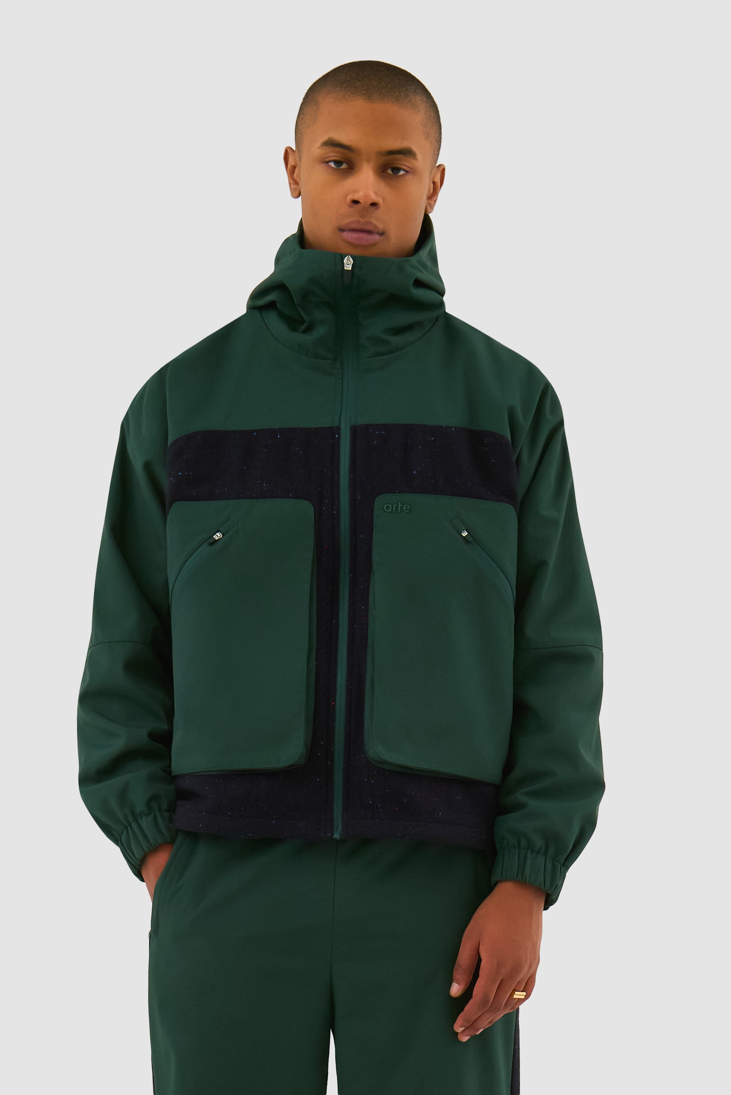 Wool Technical Jacket in Green worn by a model, half-body front view