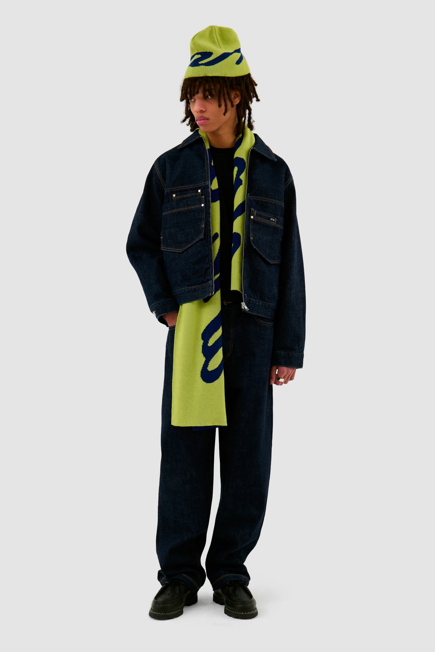 Big Logo Beanie in Light Green worn by a model, full-body front view