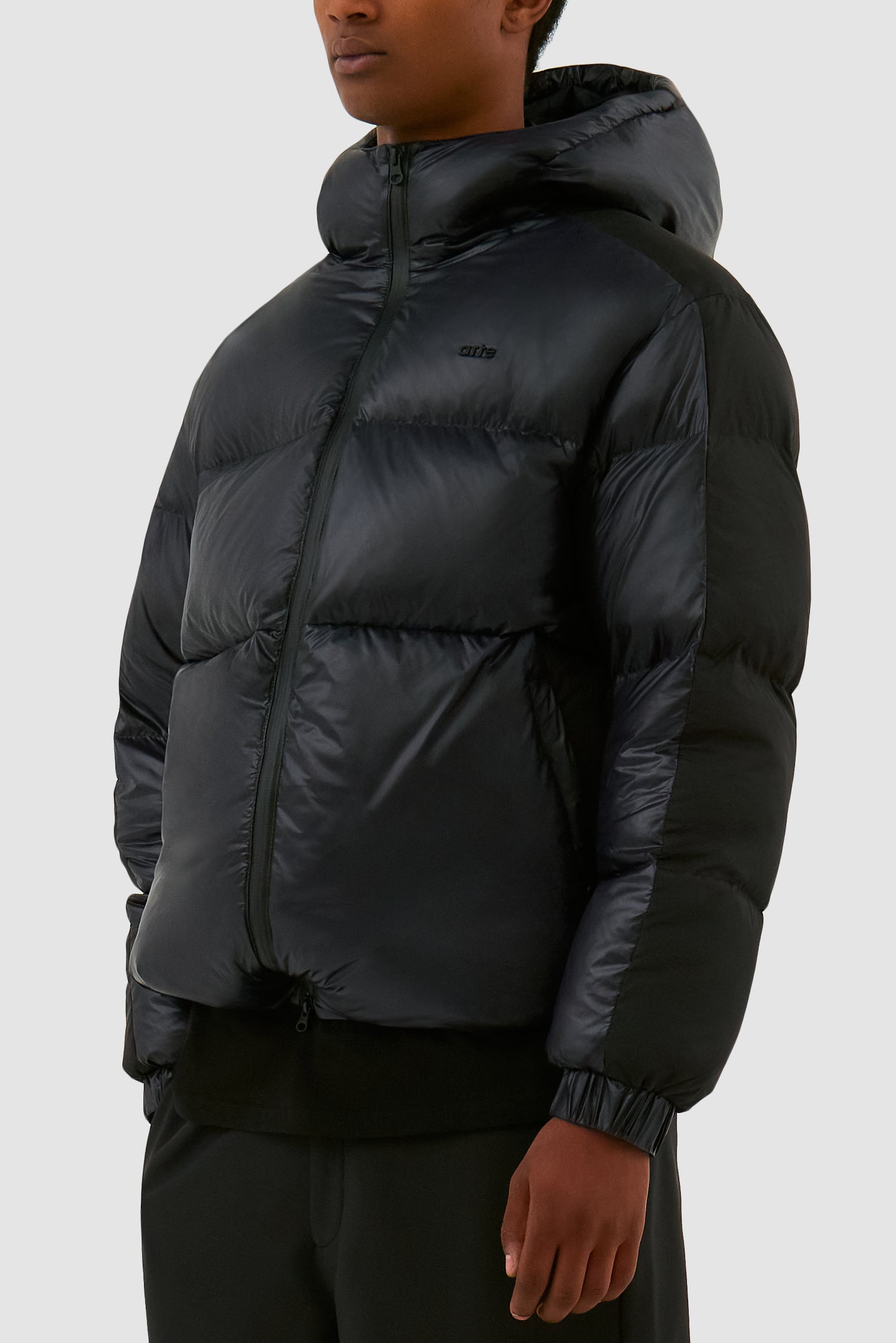 Detail view of Shiny Puffer Jacket in Black