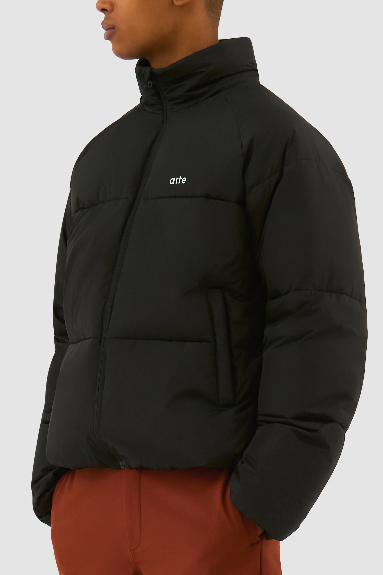 Detail view of Puffer Jacket in Black