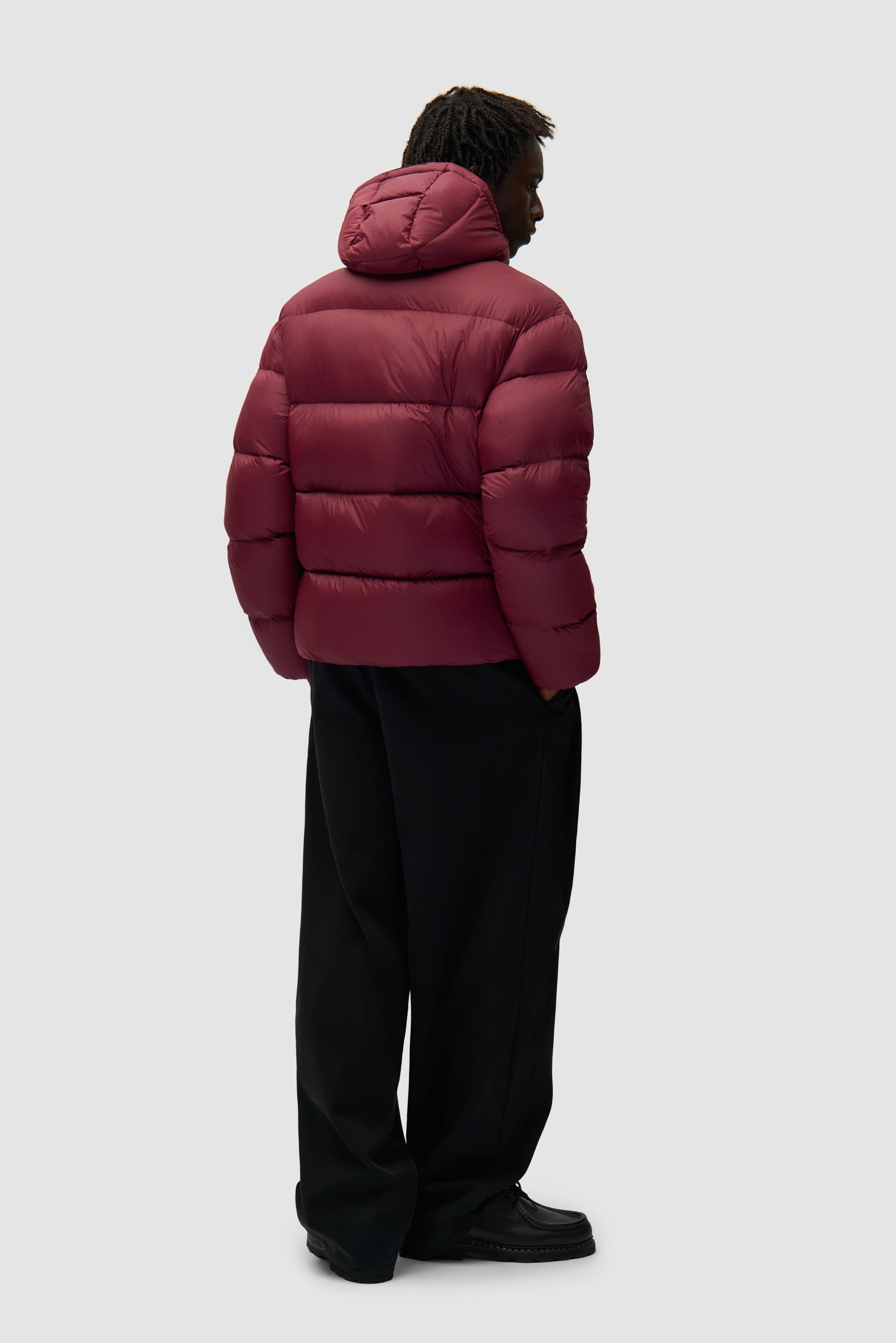 Arte Puffer Jacket in Bordeaux worn by a model, full-body back view