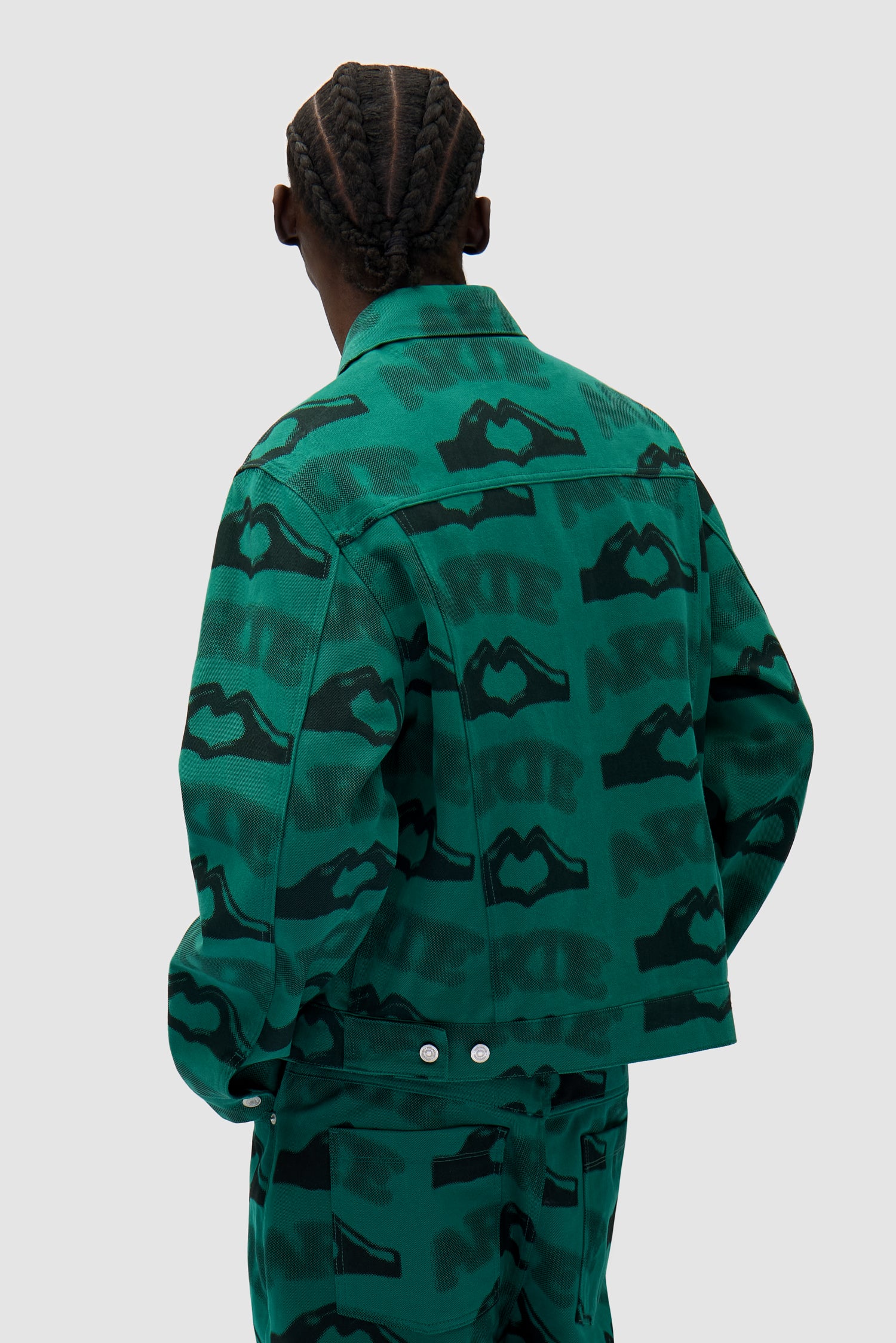 Heart Printed Jacket in Green worn by a model, half-body back view