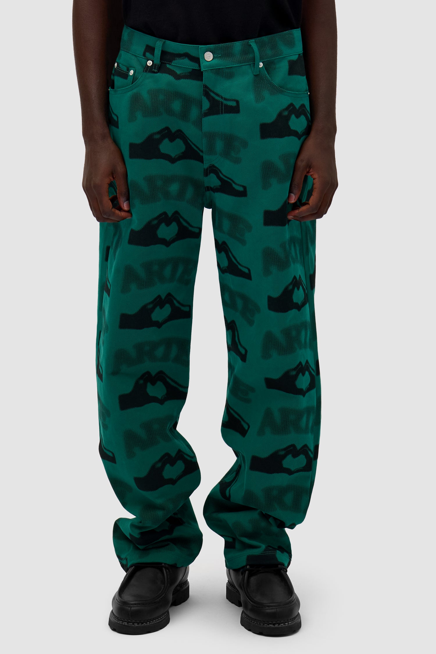 Heart Printed Pants in Green worn by a model, half-body front view