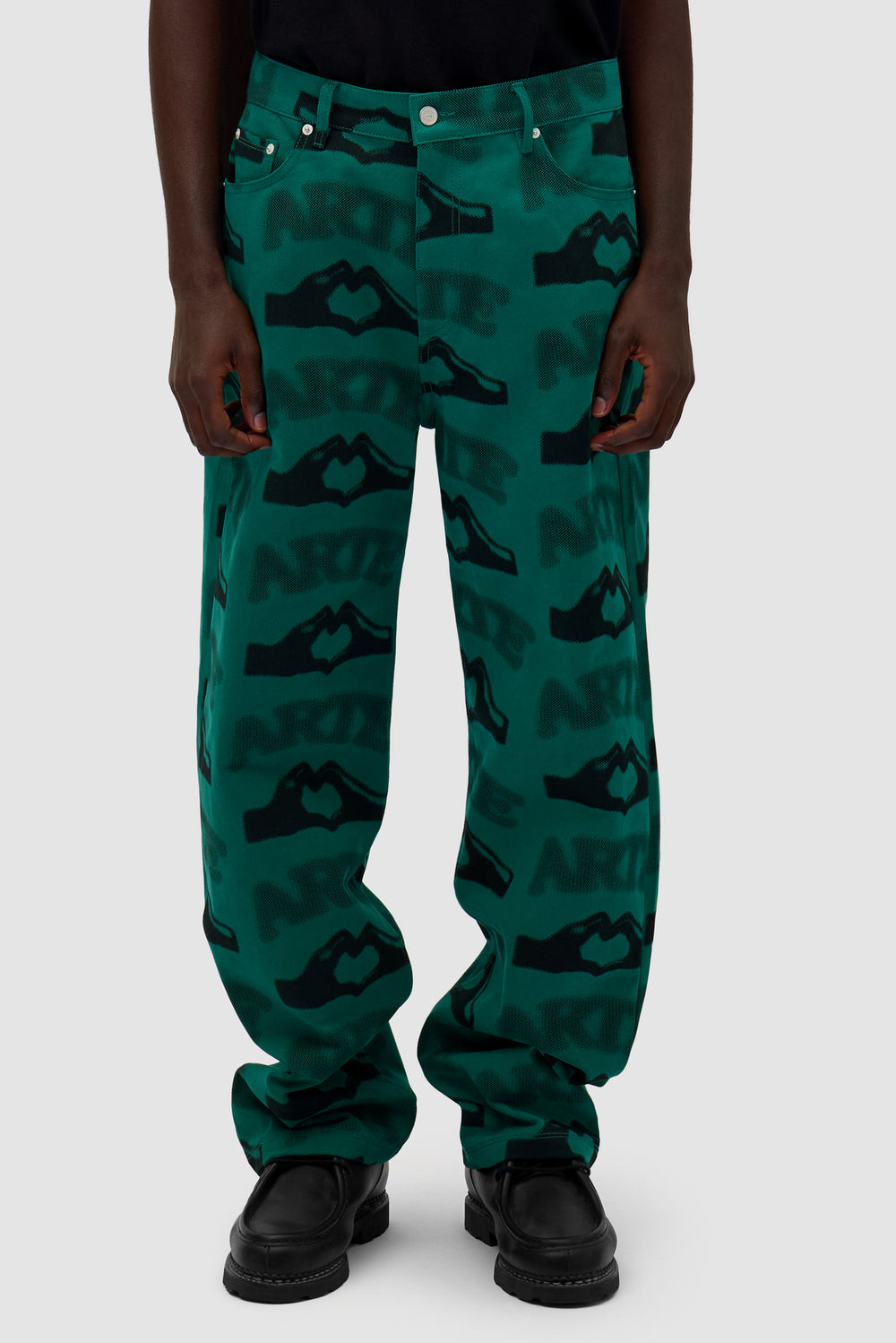Heart Printed Pants in Green worn by a model, half-body front view