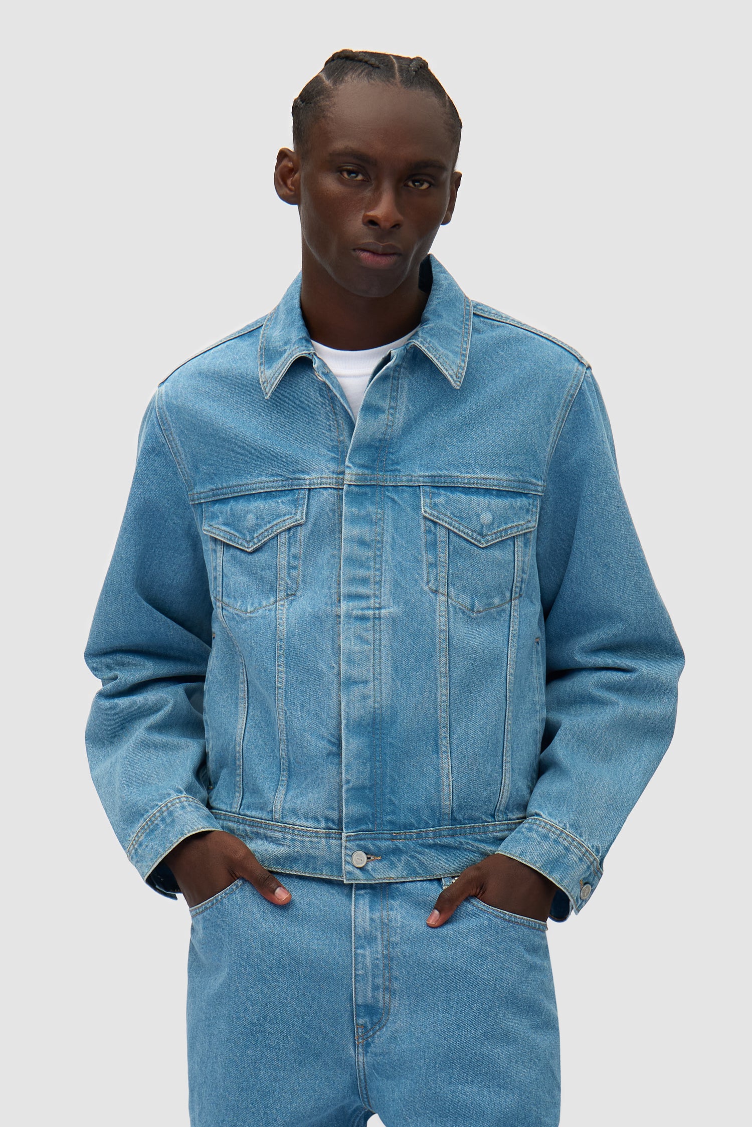 Bird Back Jacket in Bleached worn by a model, half-body front view