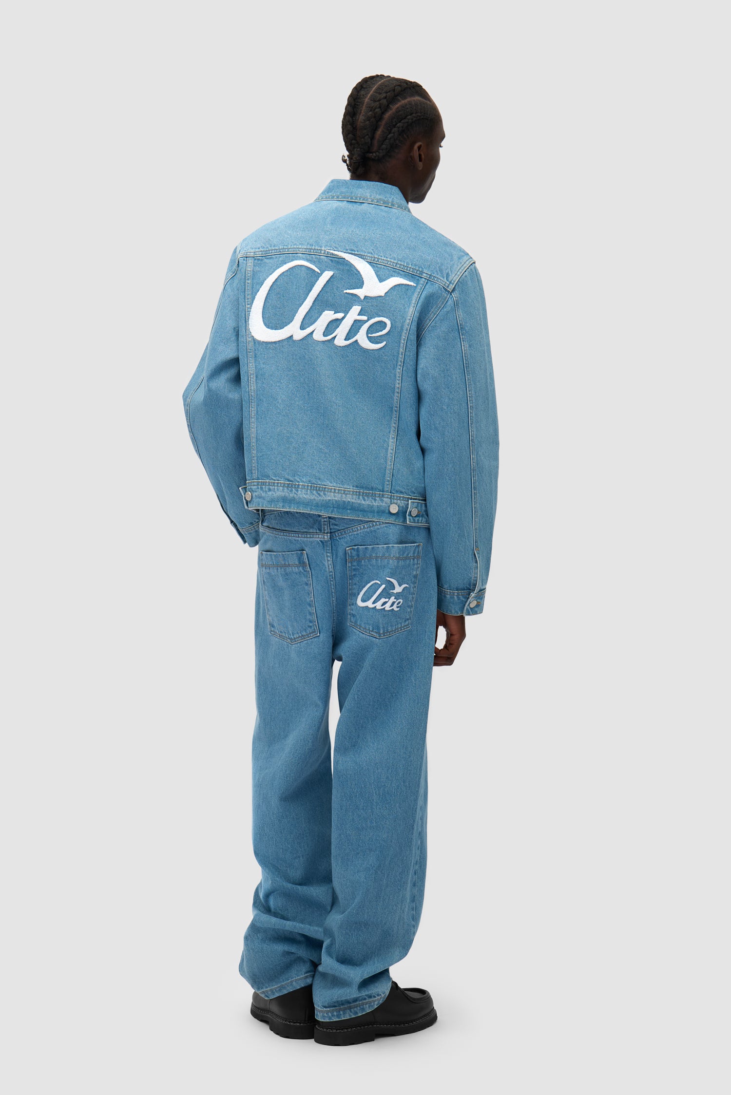 Bird Back Jacket in Bleached worn by a model, full-body front view