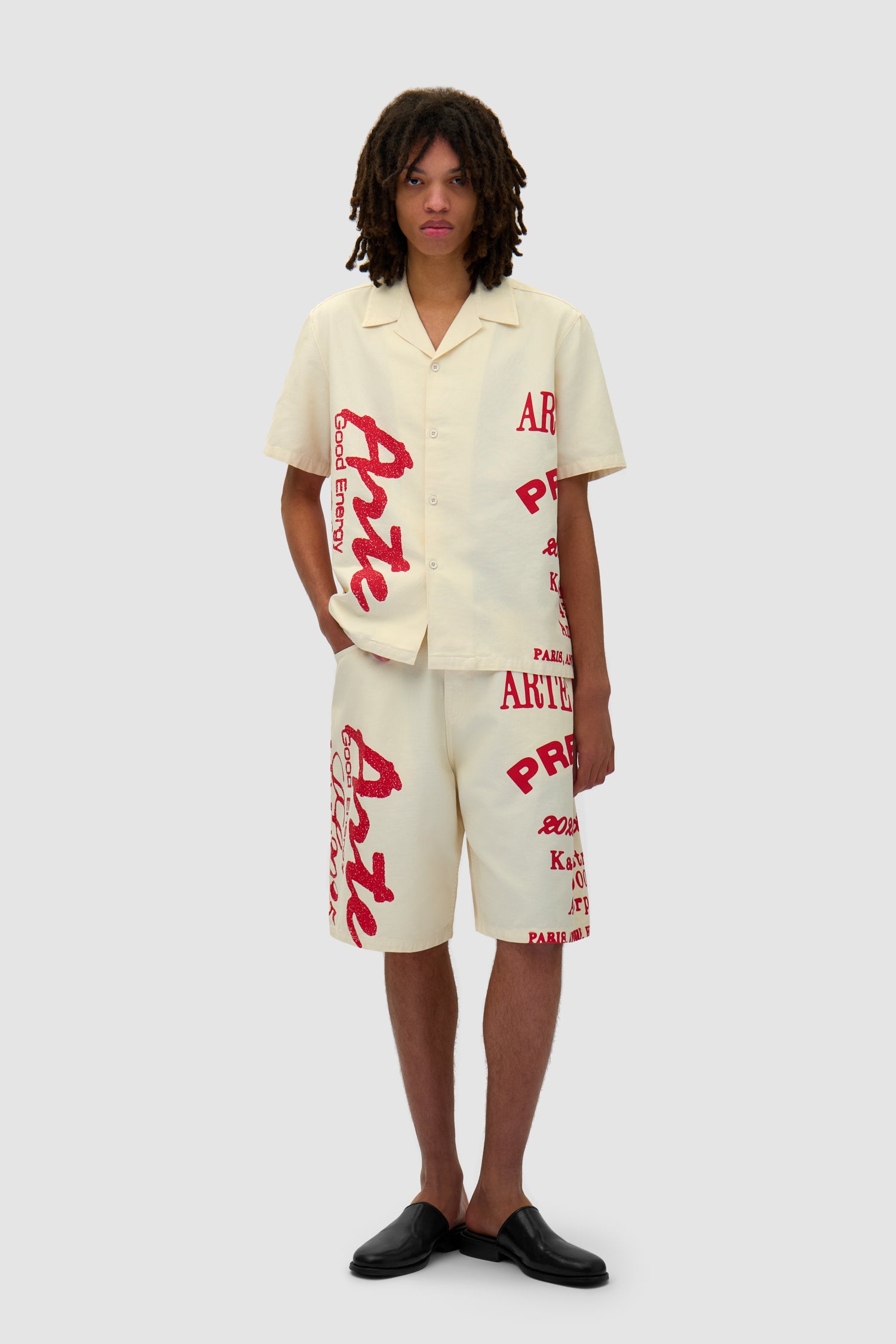 Red Print Shirt in Cream worn by a model, full-body side view