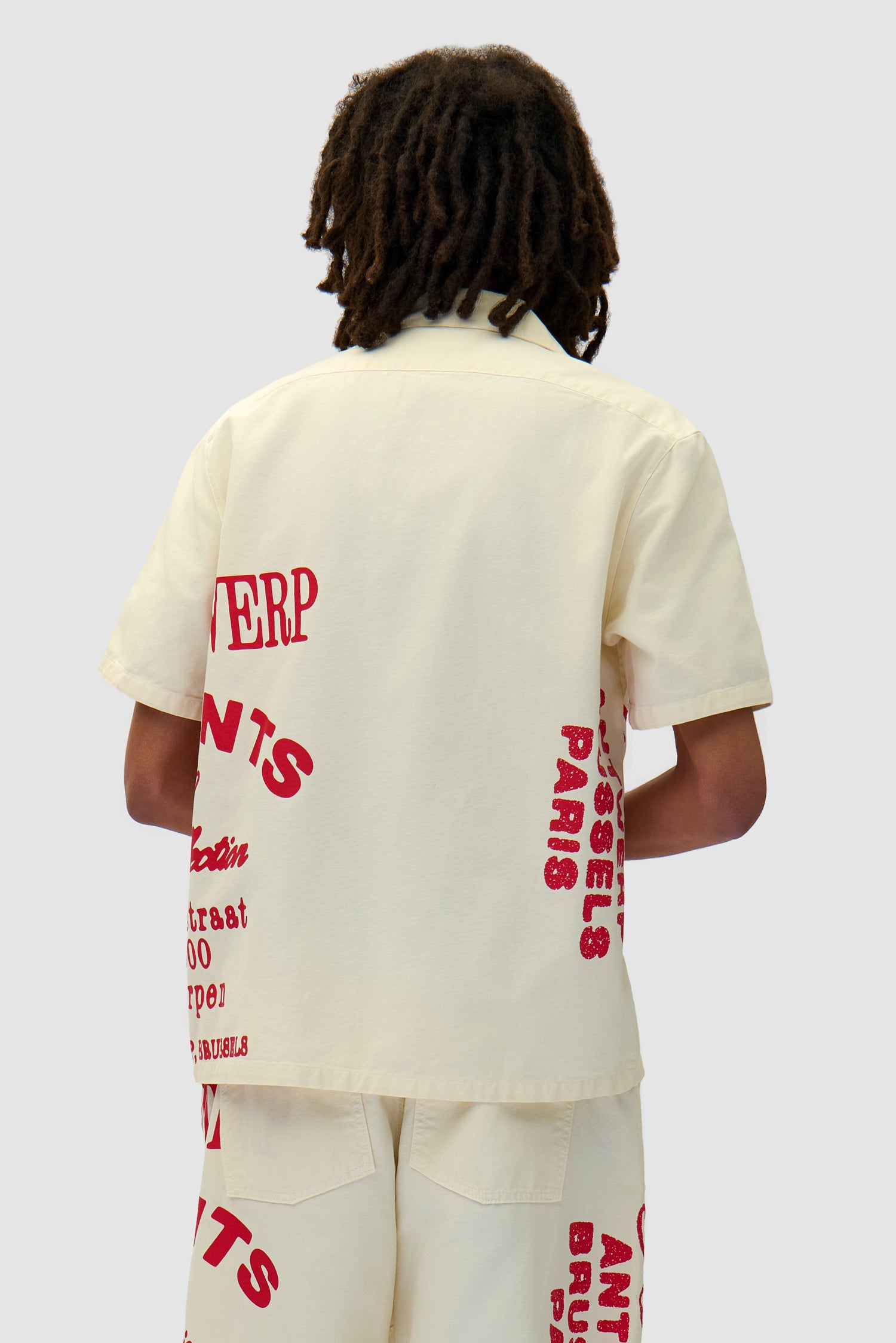 Red Print Shirt in Cream worn by a model, half-body back view