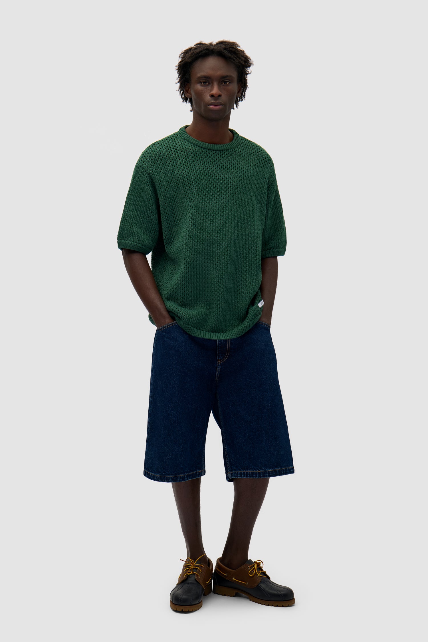 Crochet Knit T-shirt in Green worn by a model, full-body front view