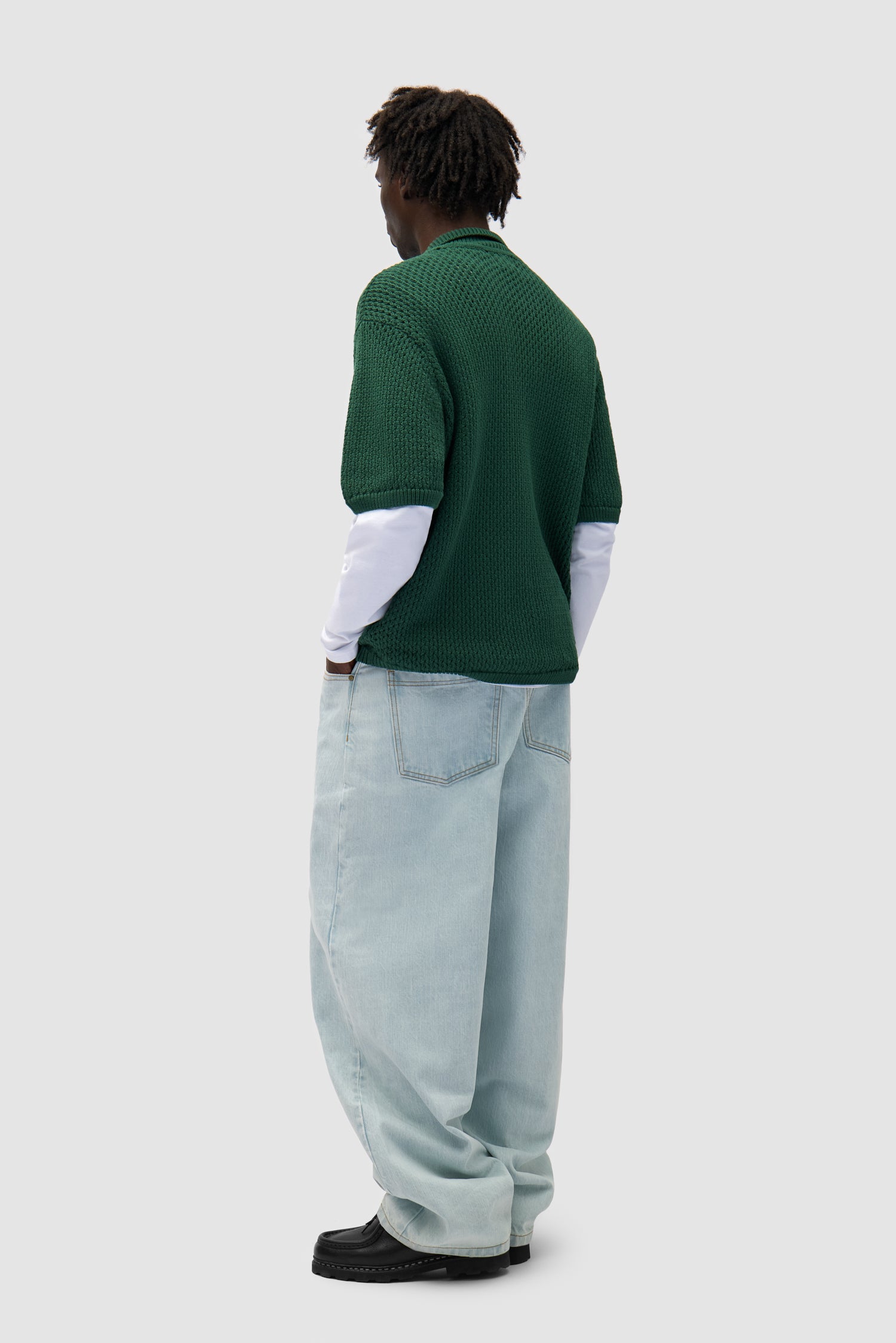 Crochet Knit Button Shirt in Green worn by a model, full-body back view