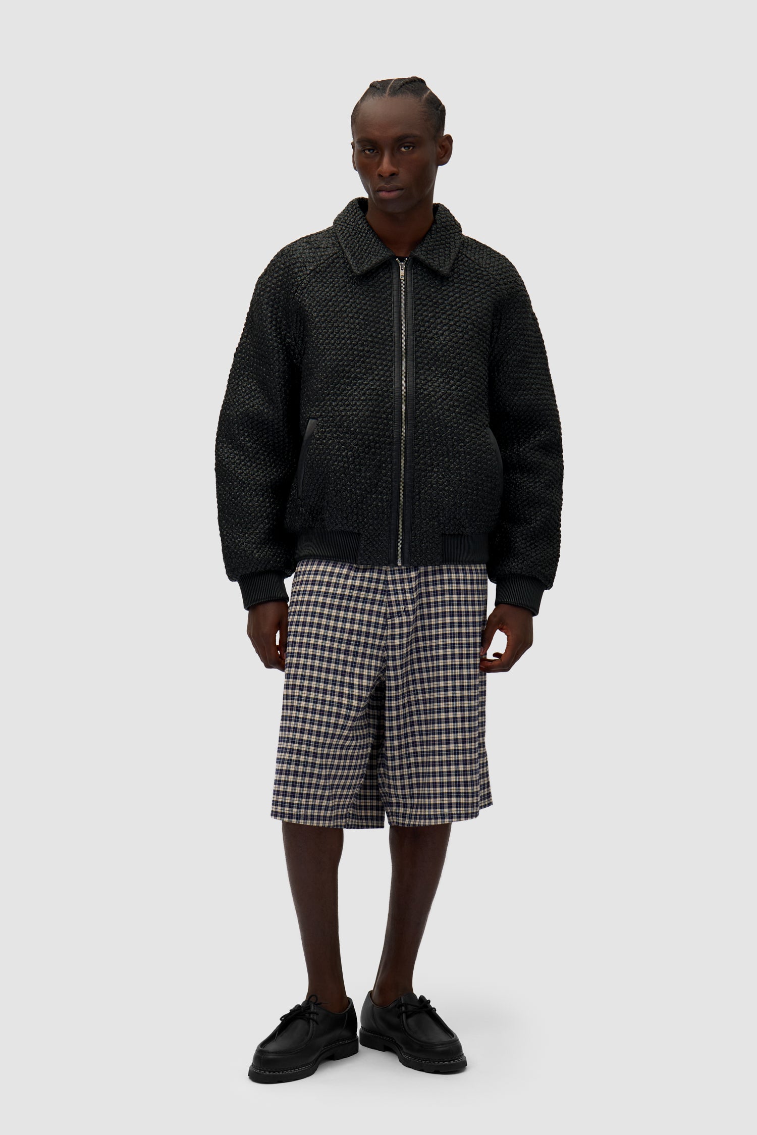 Leather Braided Jacket in Black worn by a model, full-body front view