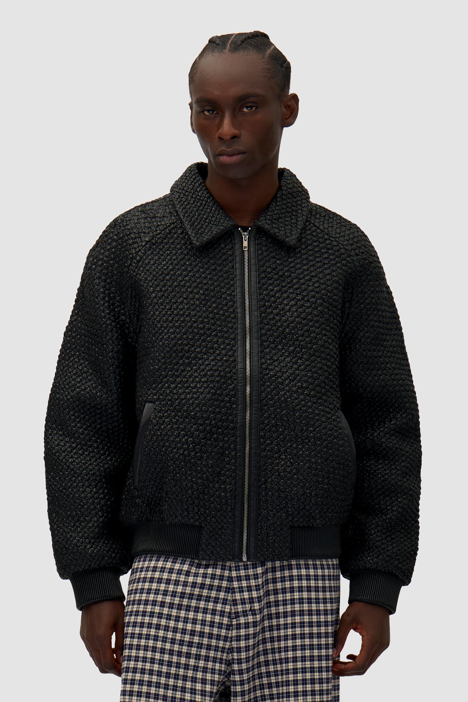 Leather Braided Jacket in Black worn by a model, half-body front view