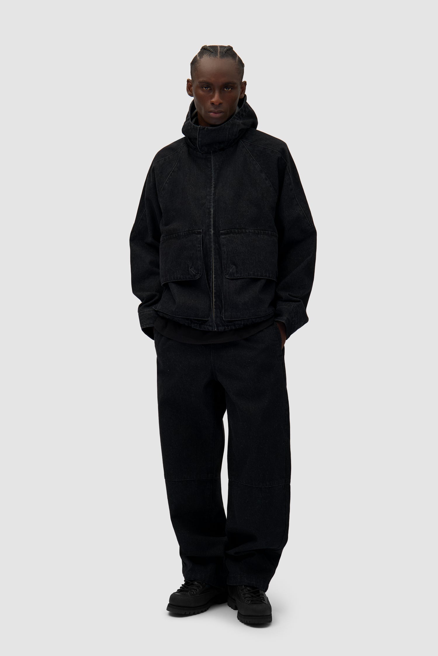 Denim Tech jacket in Black worn by a model, full-body front view