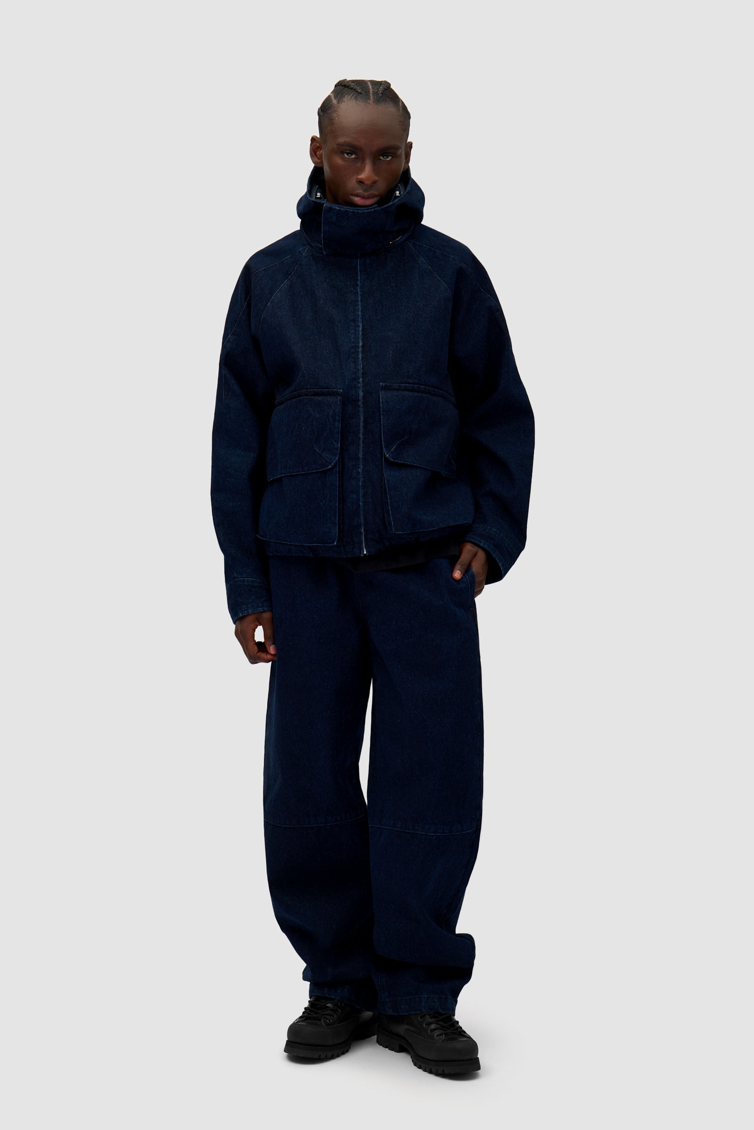 Denim Tech jacket in Navy worn by a model, full-body front view