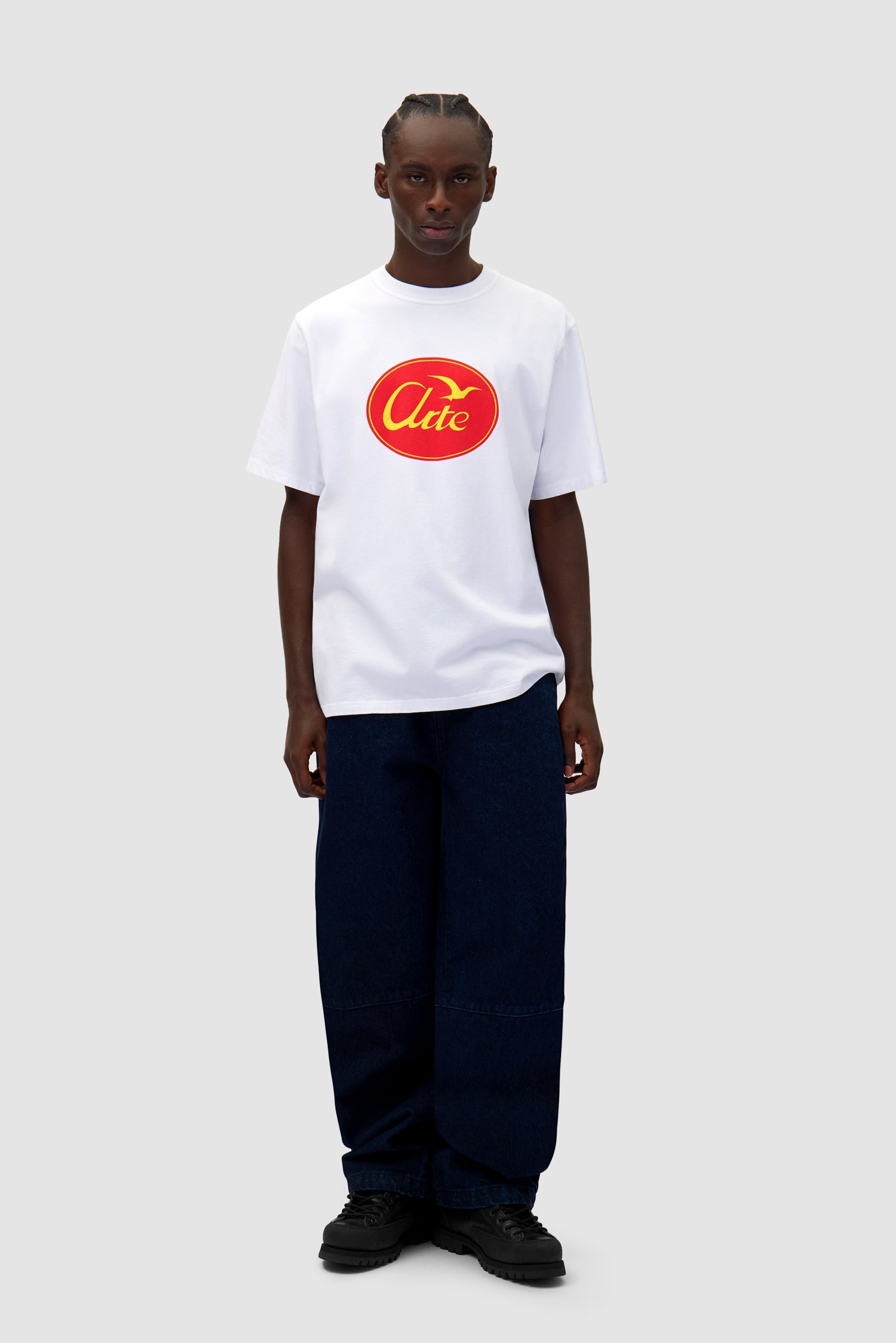 Denim Tech Pants in Navy worn by a model, full-body front view