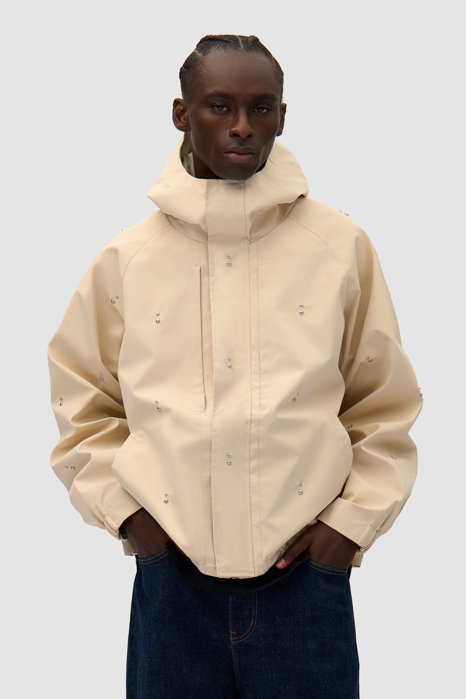 Technical Revits Jacket in Cream worn by a model, half-body front view