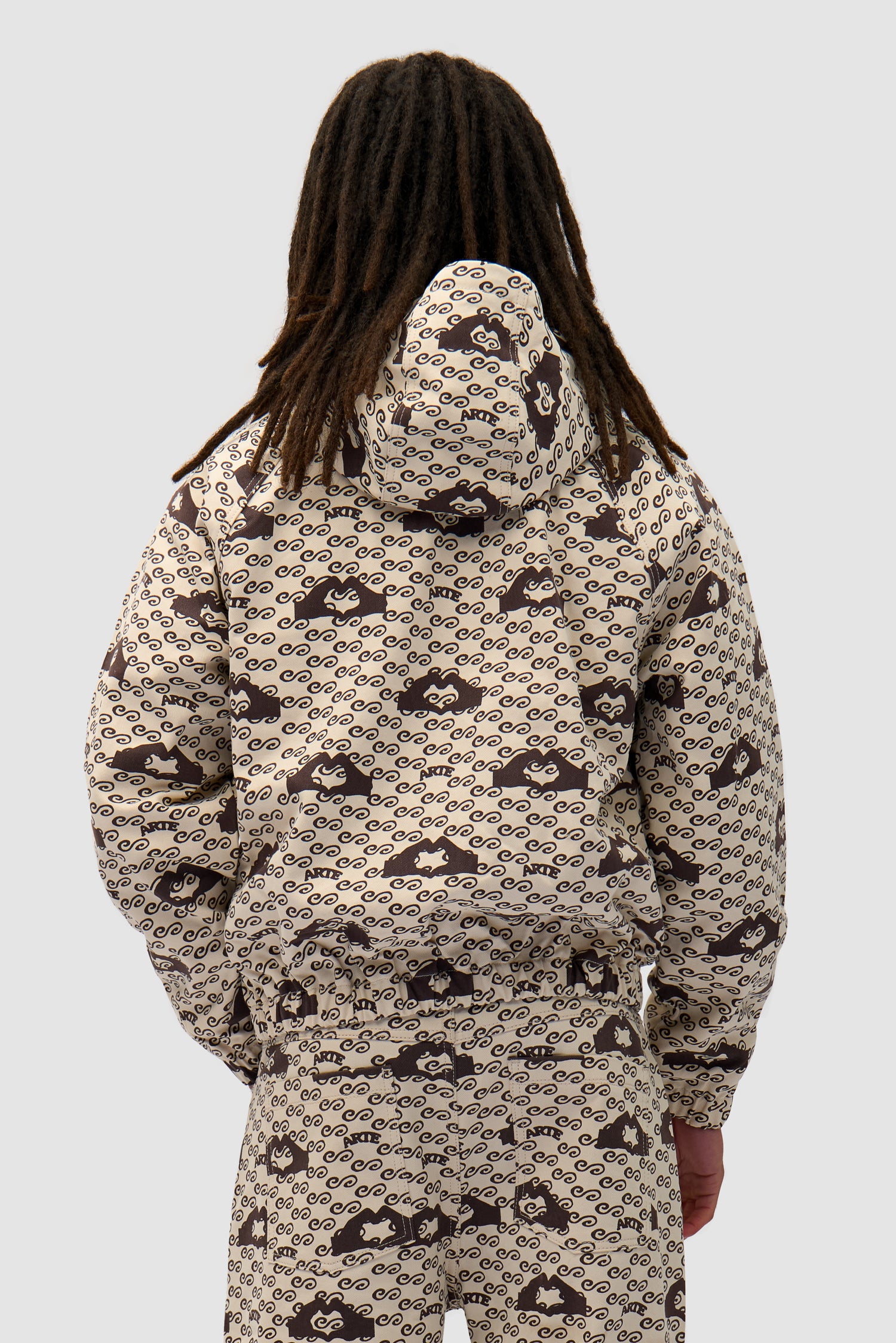 Hand Heart Print Jacket in Cream/Brown worn by a model, half-body back view