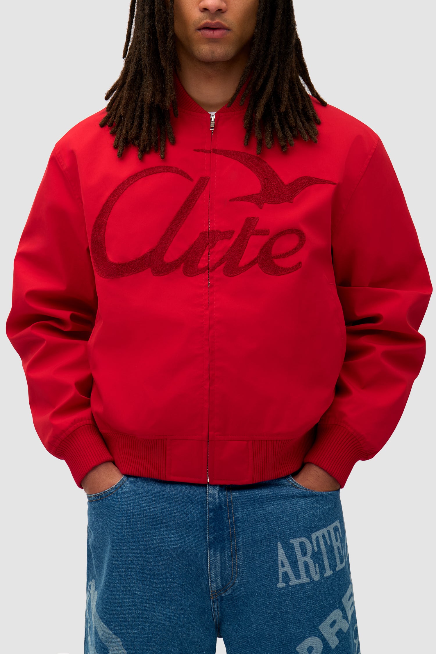 Detail view of Logo Bird Bomber Jacket in Red