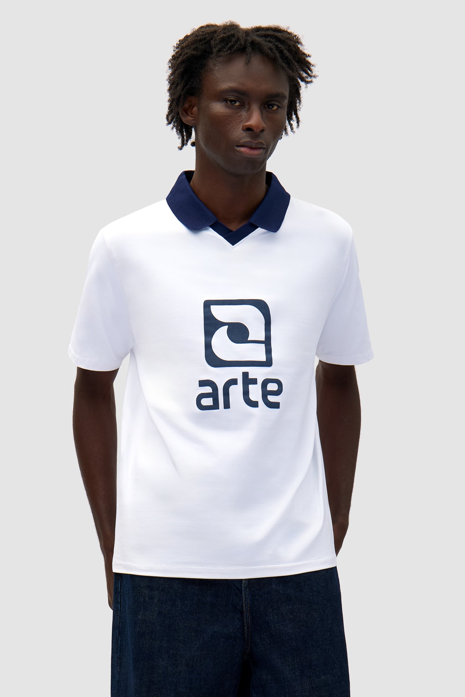 Logo Collar T-shirt in White/Navy worn by a model, half-body front view