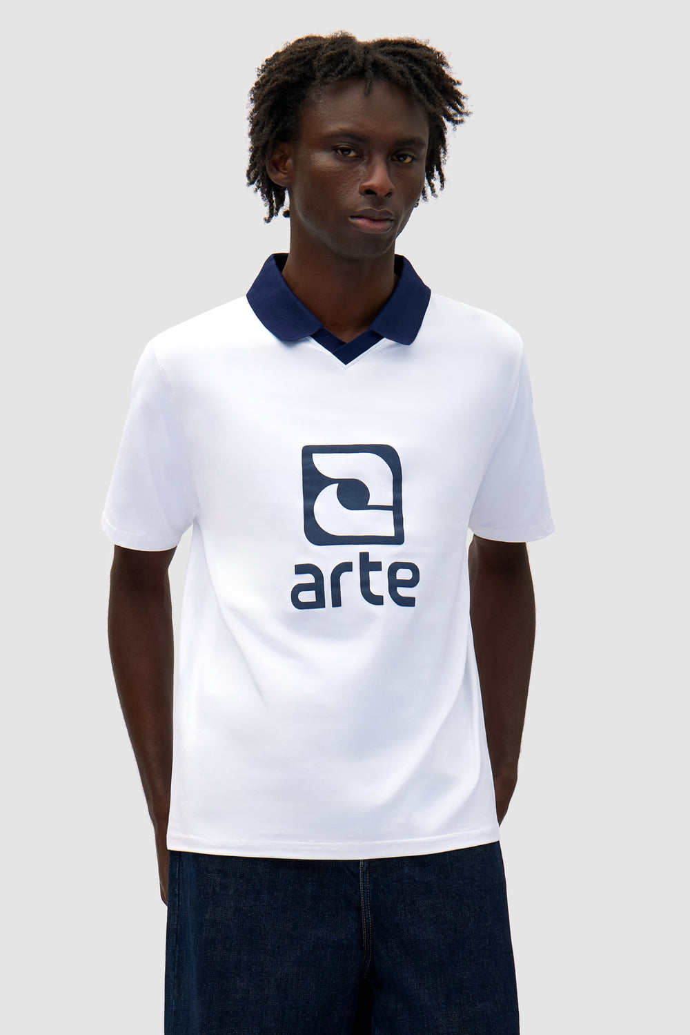 Logo Collar T-shirt in White/Navy worn by a model, half-body front view
