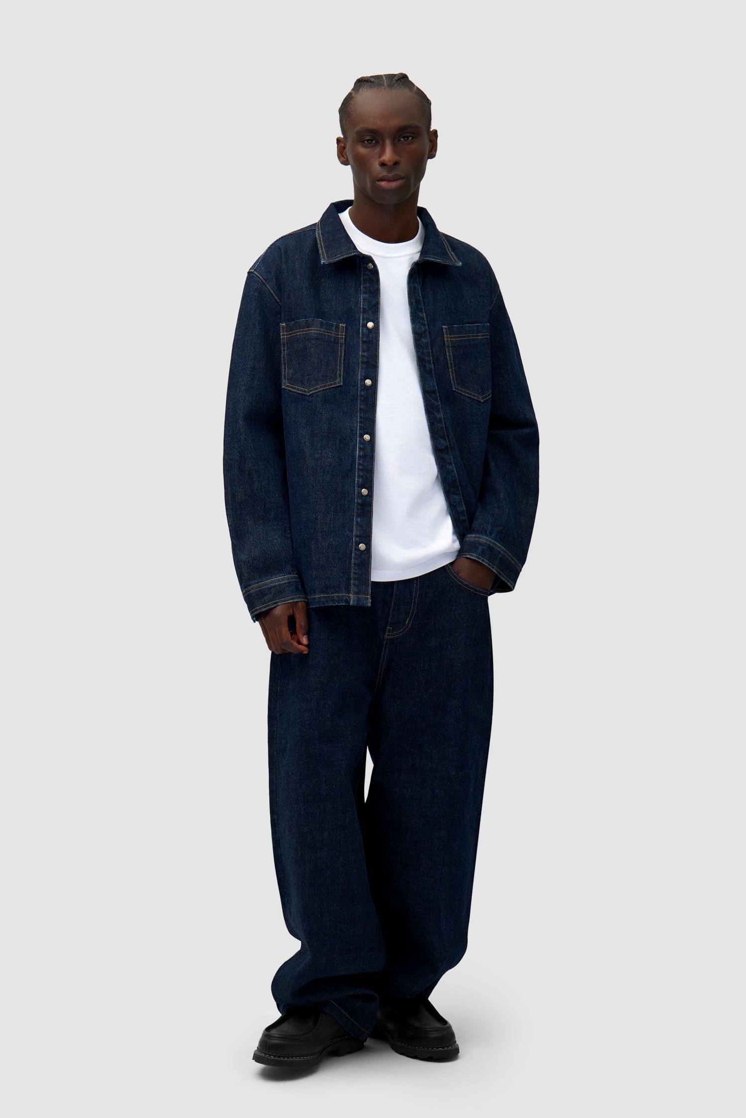 Oversized Denim Shirt in Dark Wash worn by a model, full-body front view