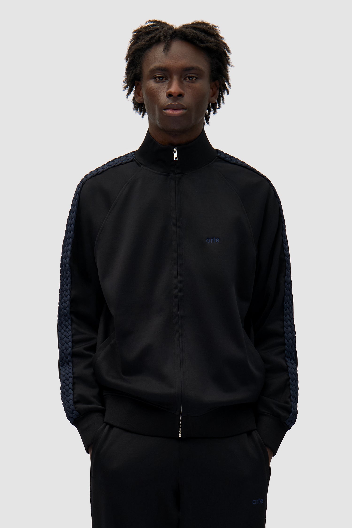 Braid Strip Jacket in Black worn by a model, half-body front view