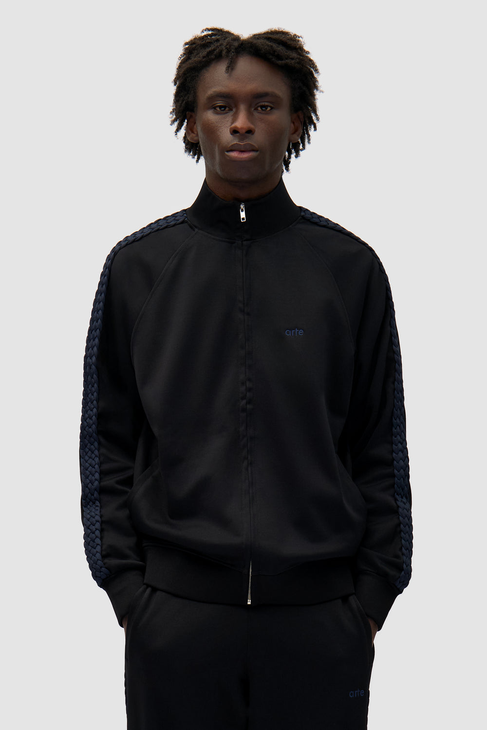 Braid Strip Jacket in Black worn by a model, half-body front view