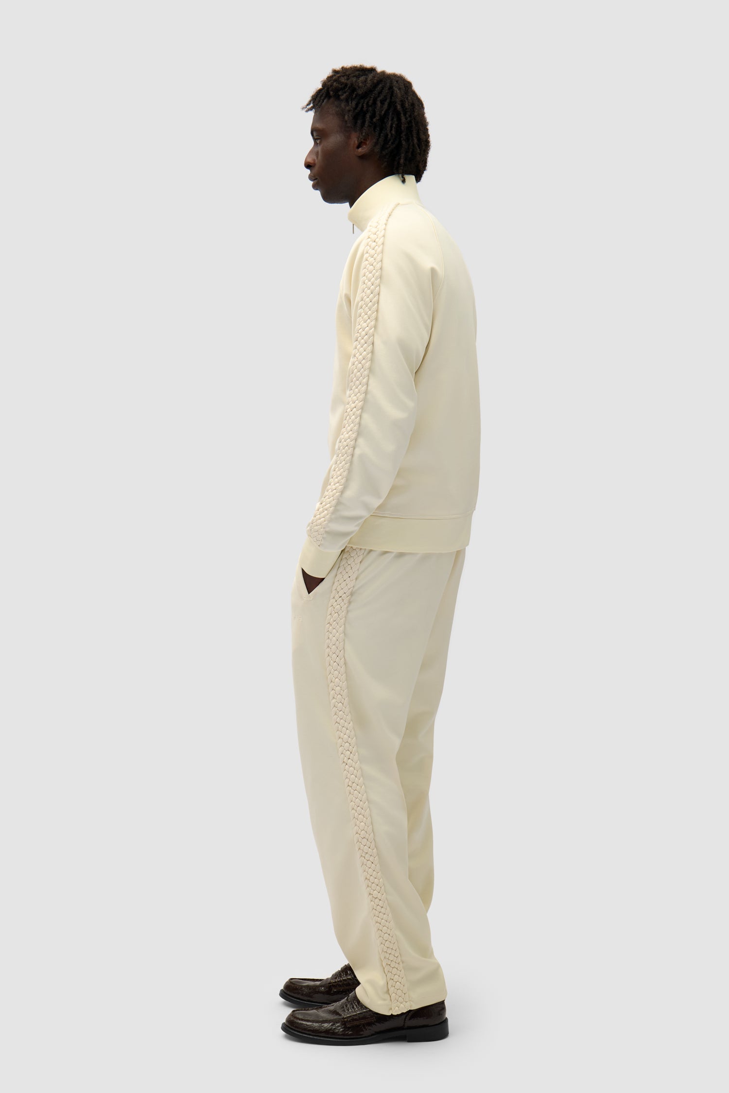 Braid Strip Jacket in Cream worn by a model, full-body back view