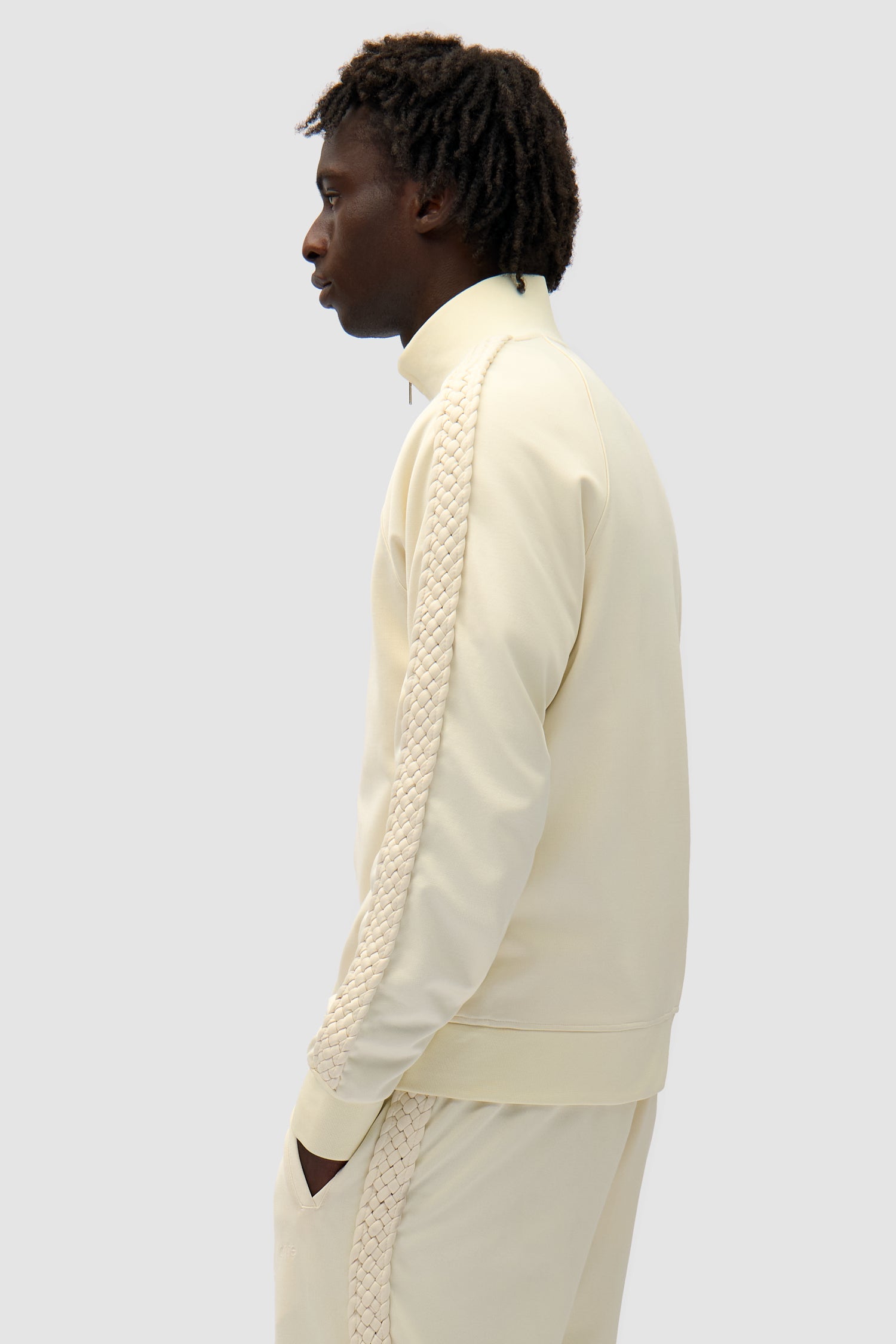 Braid Strip Jacket in Cream worn by a model, half-body back view