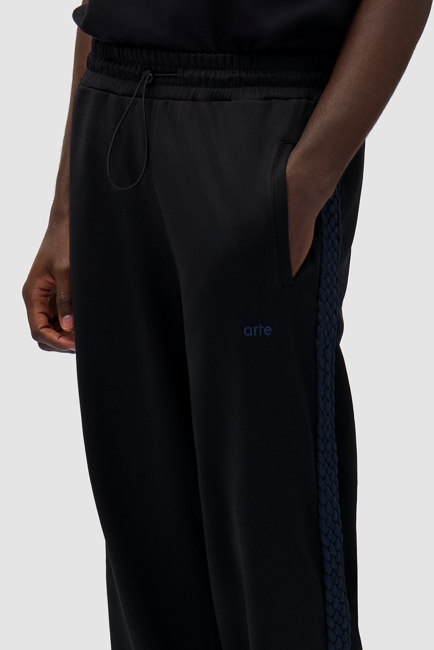 Detail view of Braid Strip Pants in Black