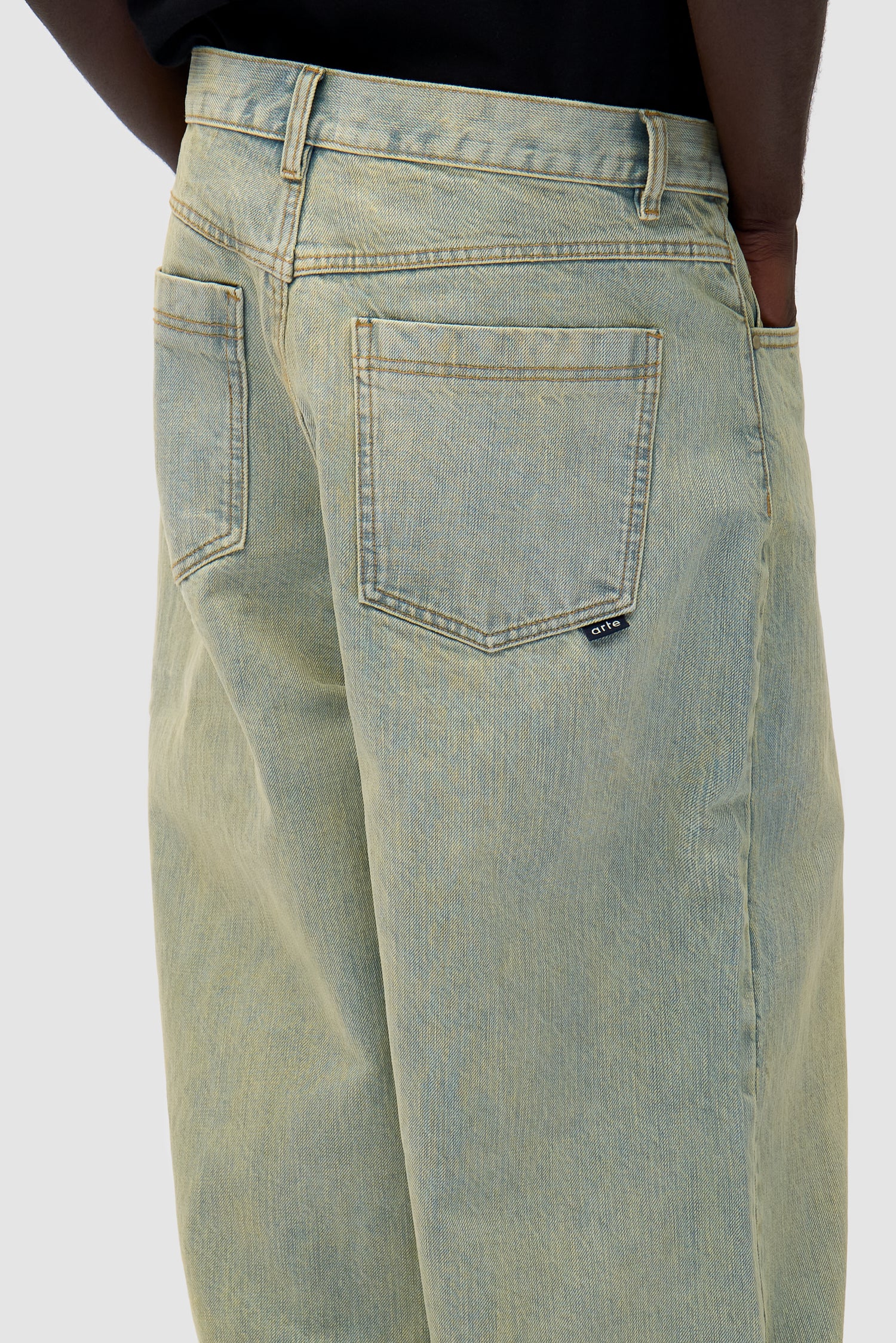 Denim Pants in Dirty Wash worn by a model, full-body front view