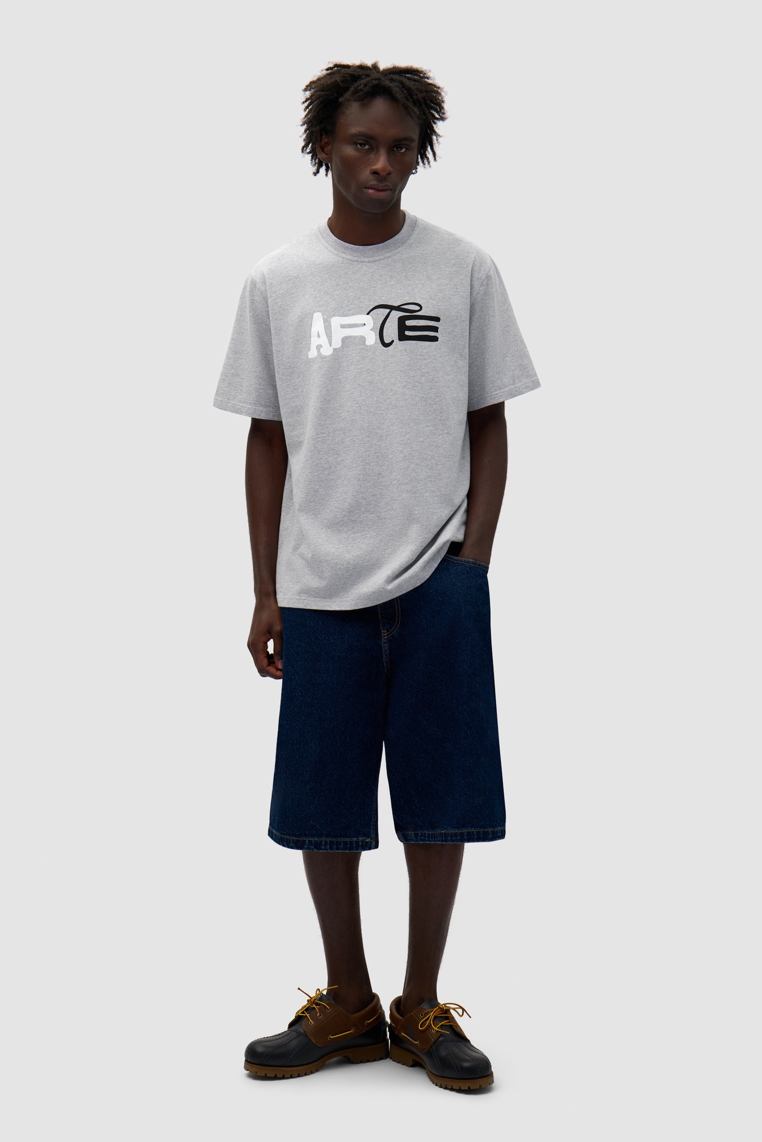 Duo Print Logo T-shirt in Grey worn by a model, half-body back view