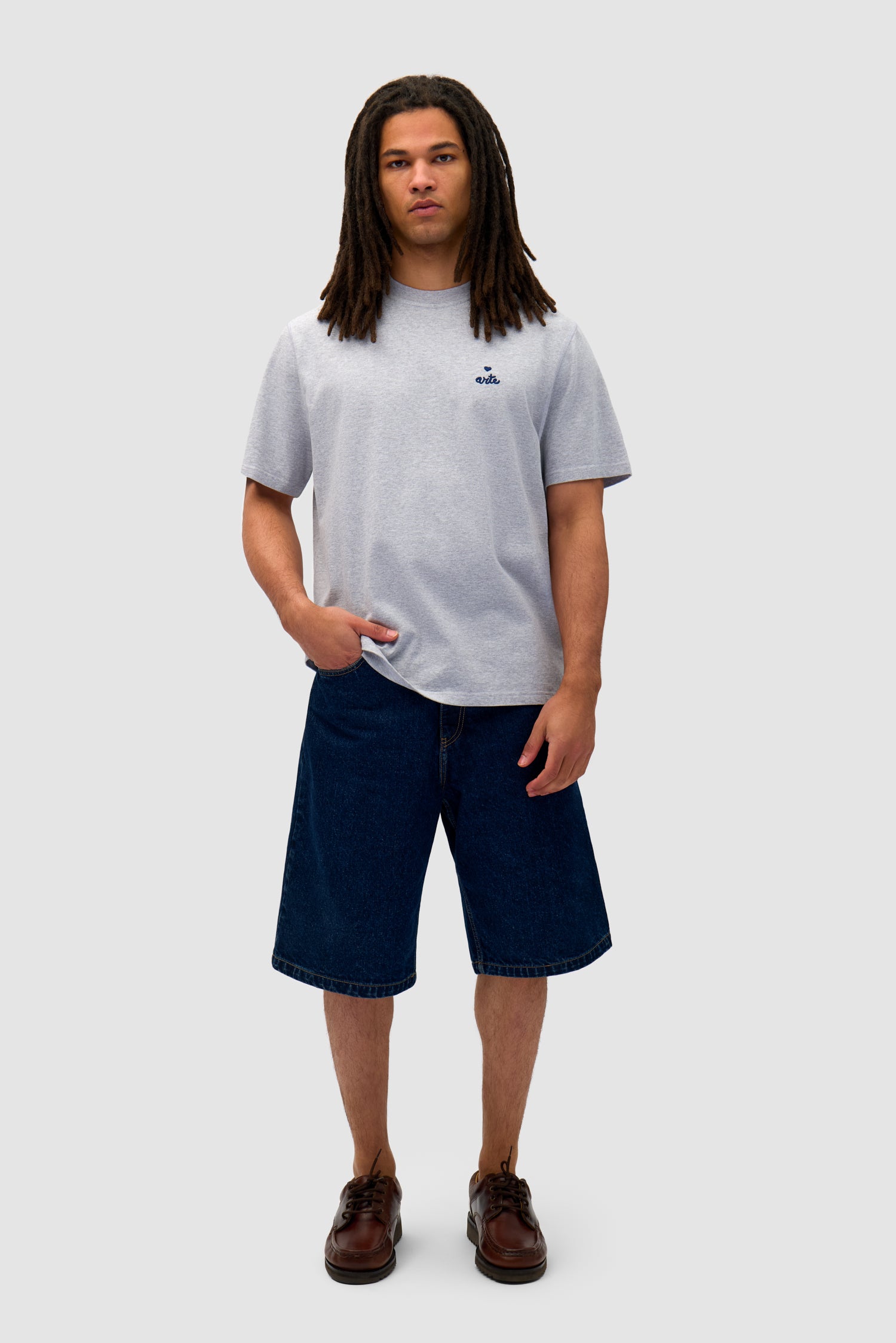 Heart Logo T-shirt in Grey worn by a model, full-body front view