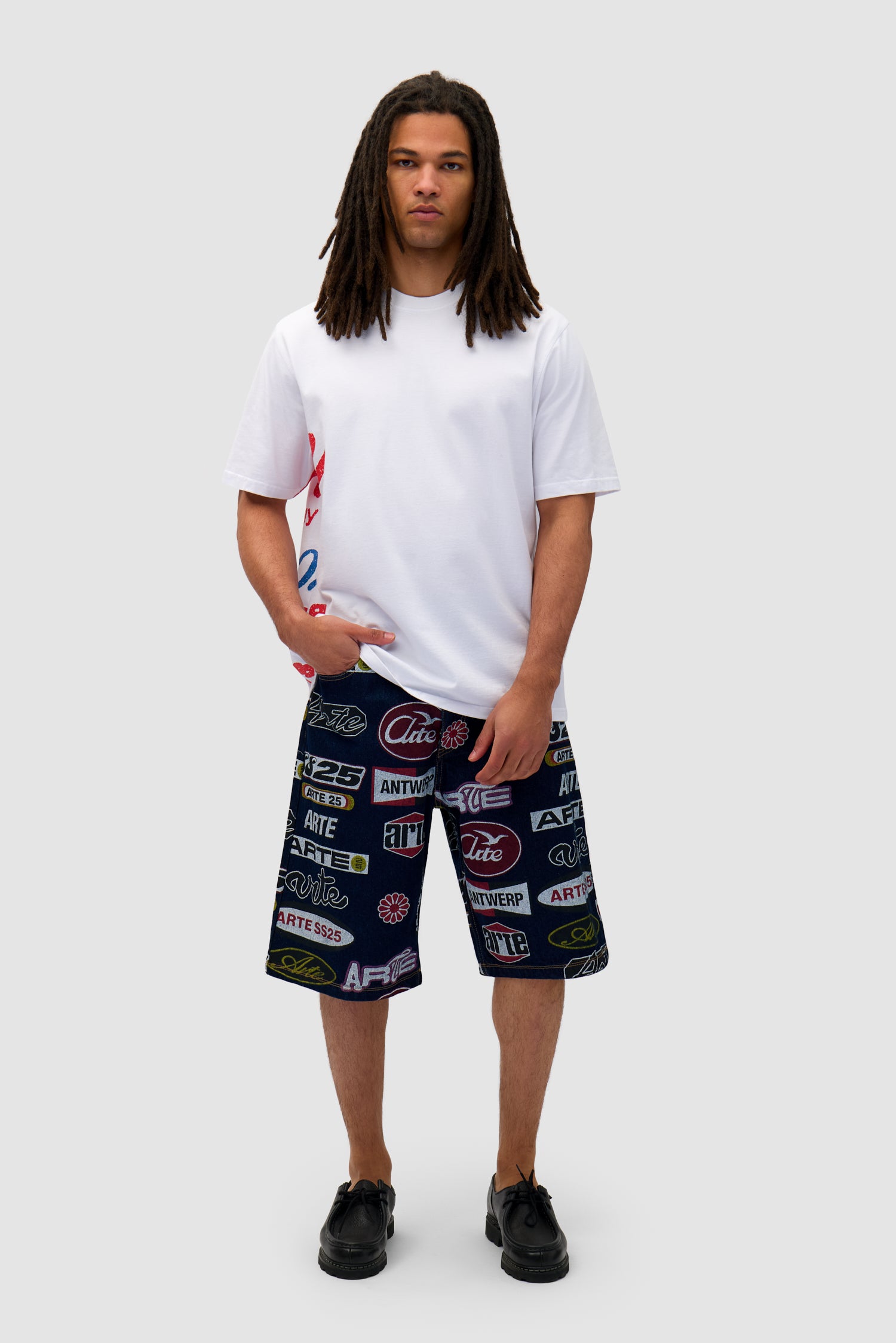 Side Print T-shirt in White worn by a model, full-body front view