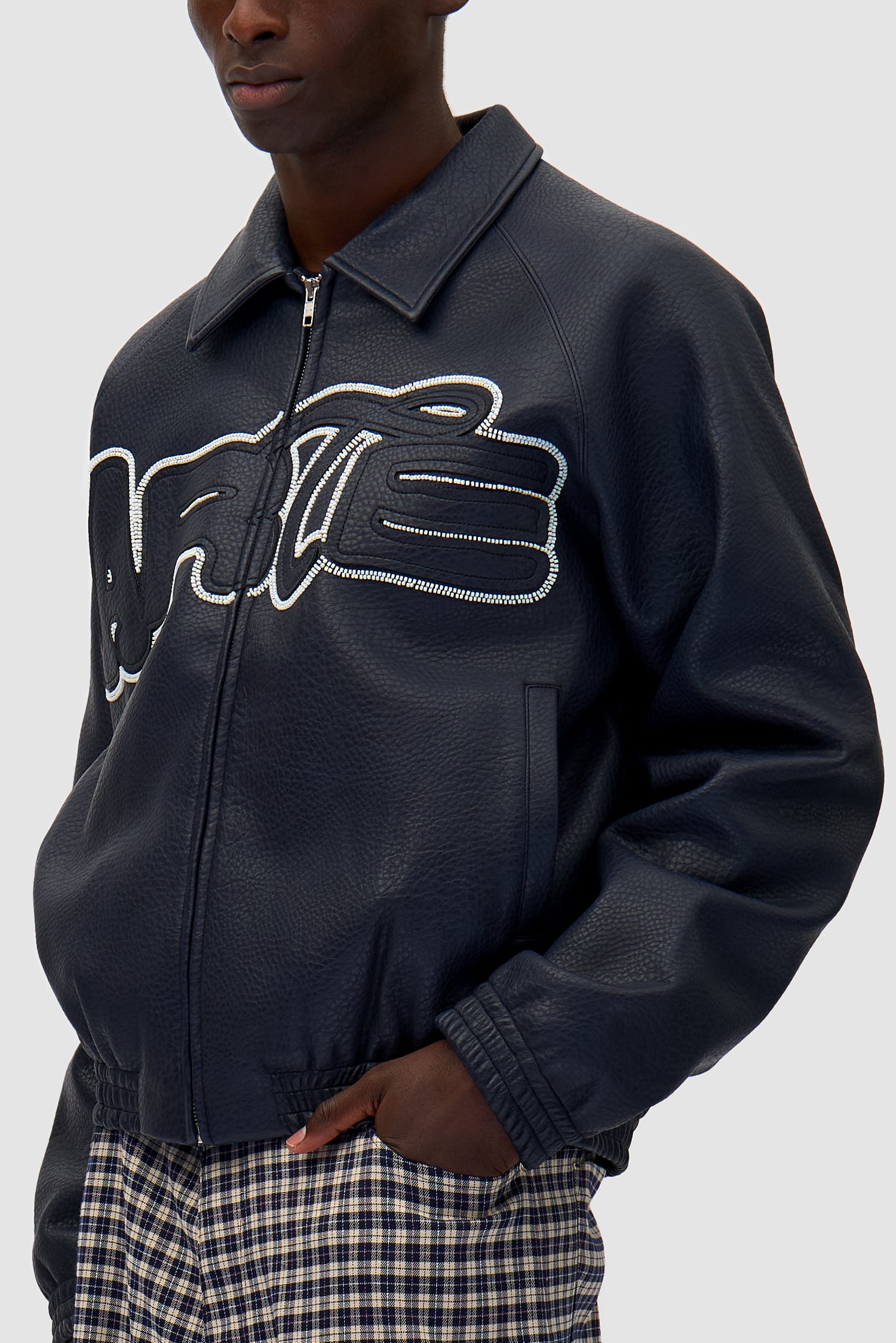 Detail view of Big Logo Leather Jacket in Navy