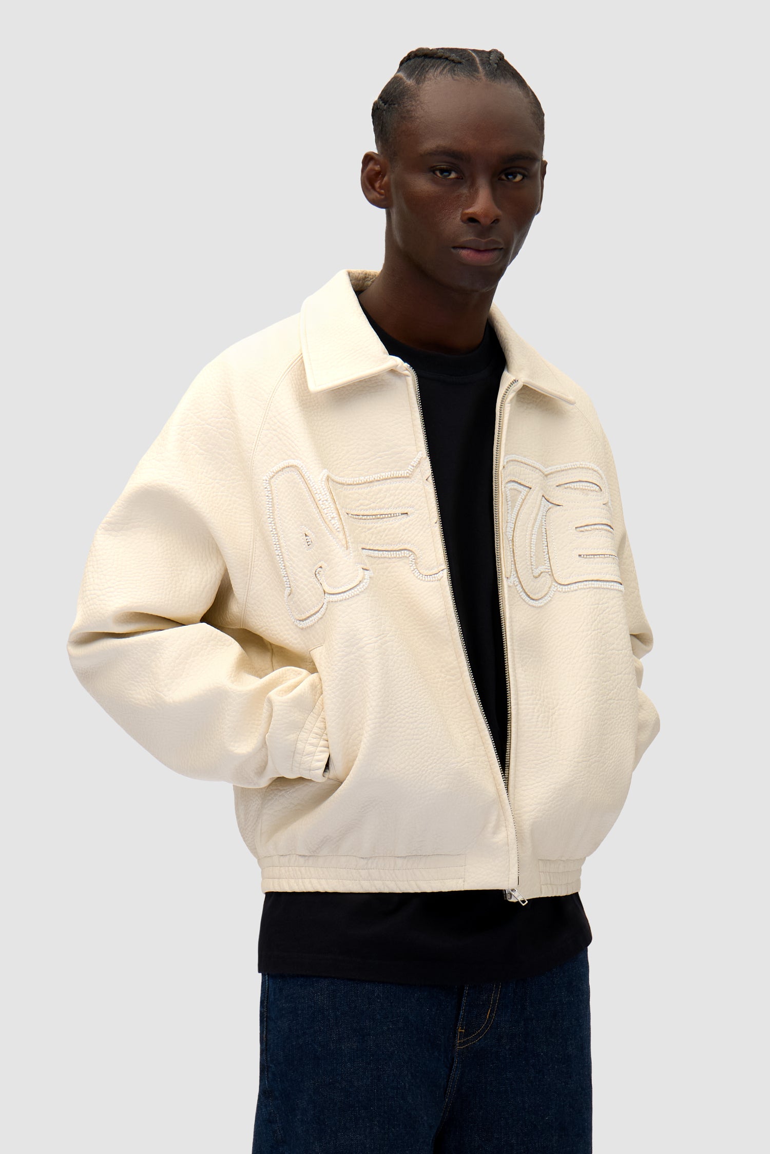 Detail view of Big Logo Leather Jacket in Cream