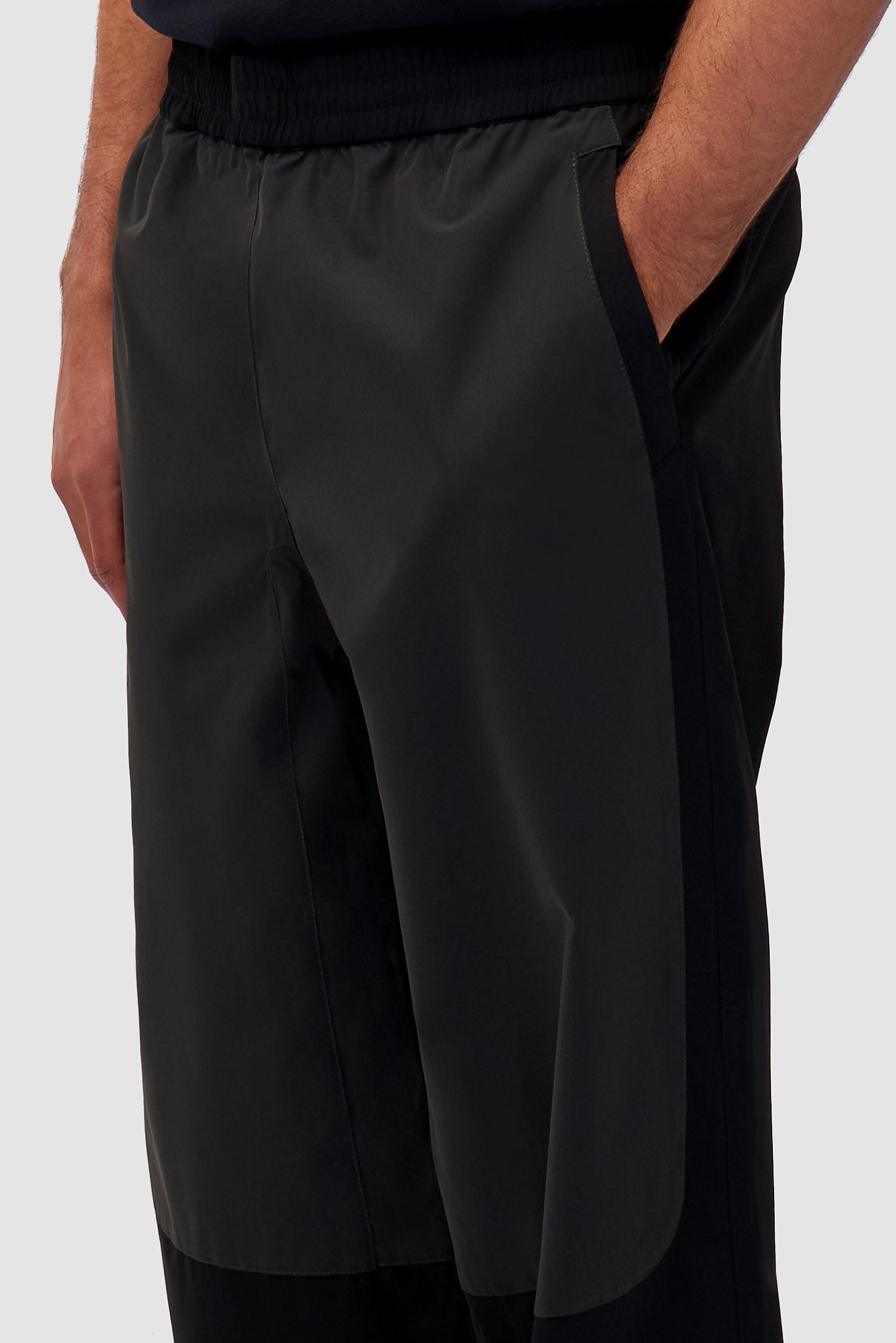 Detail view of Tracksuit Pants in Black