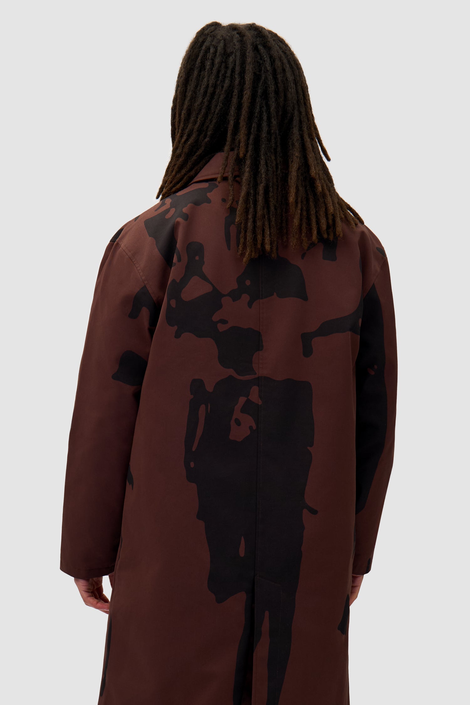 Printed People Brown Coat in Brown/Black worn by a model, half-body back view