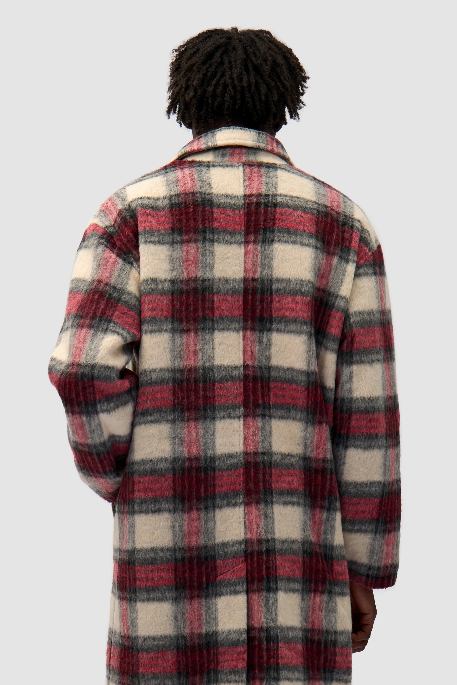 Plaid Coat in Plaid worn by a model, half-body back view