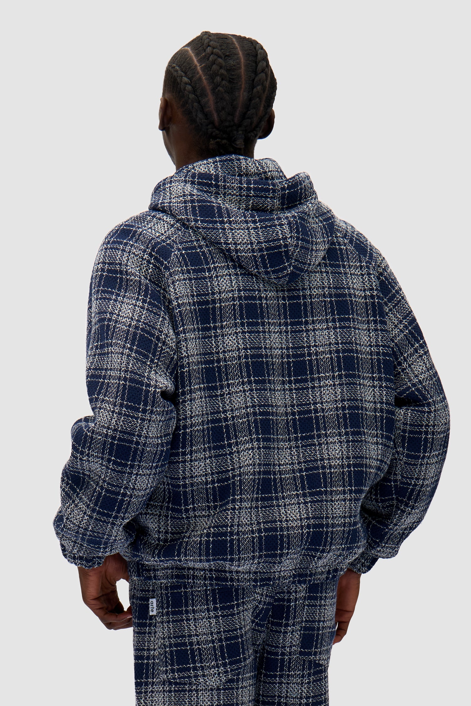Plaid Navy Jacket in Plaid/Navy worn by a model, half-body back view