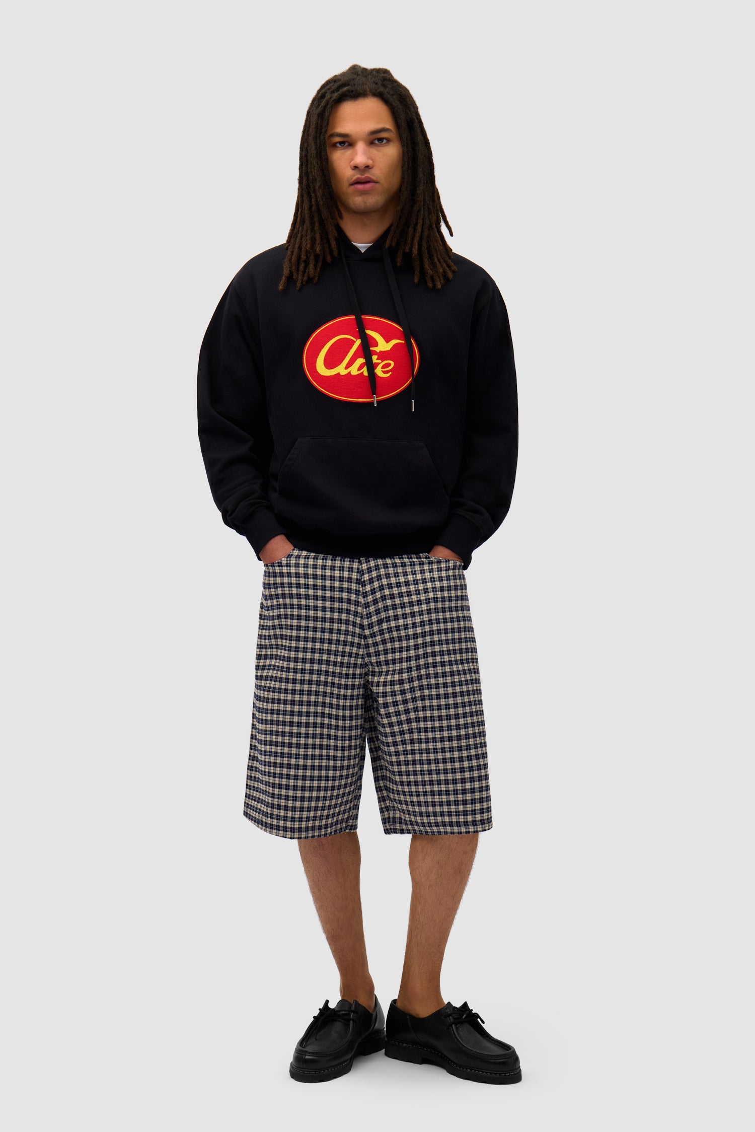 Big Bird Hoodie in Black worn by a model, full-body front view