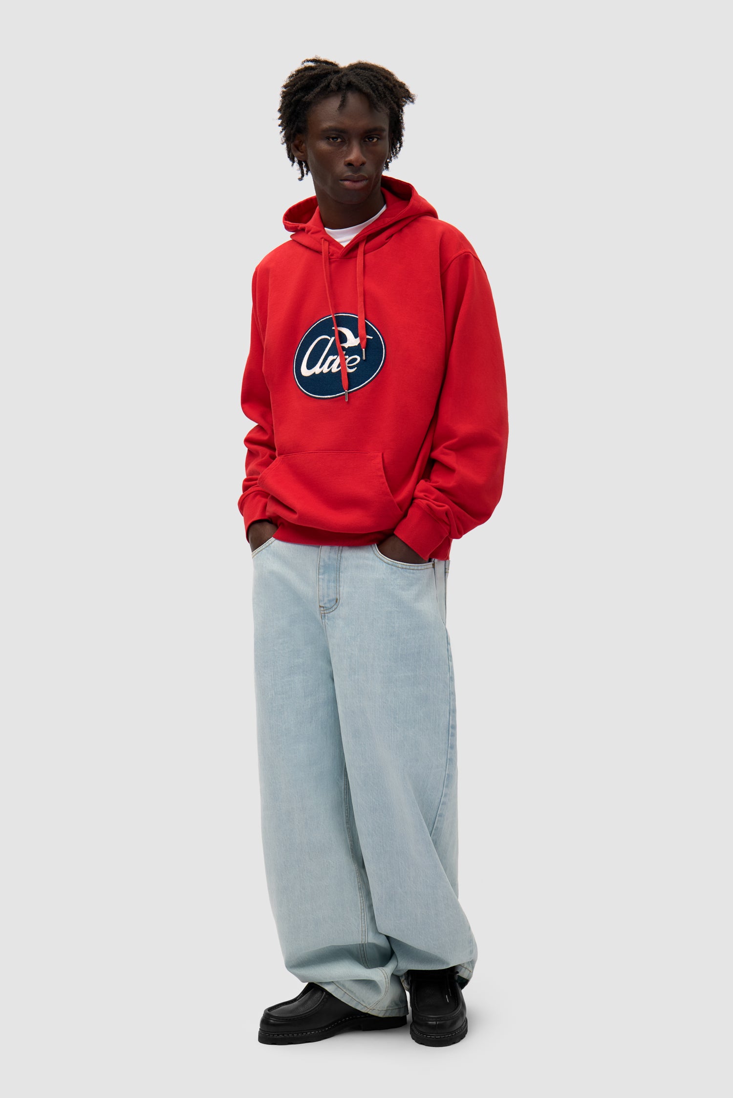 Big Bird Hoodie in Red worn by a model, full-body front view