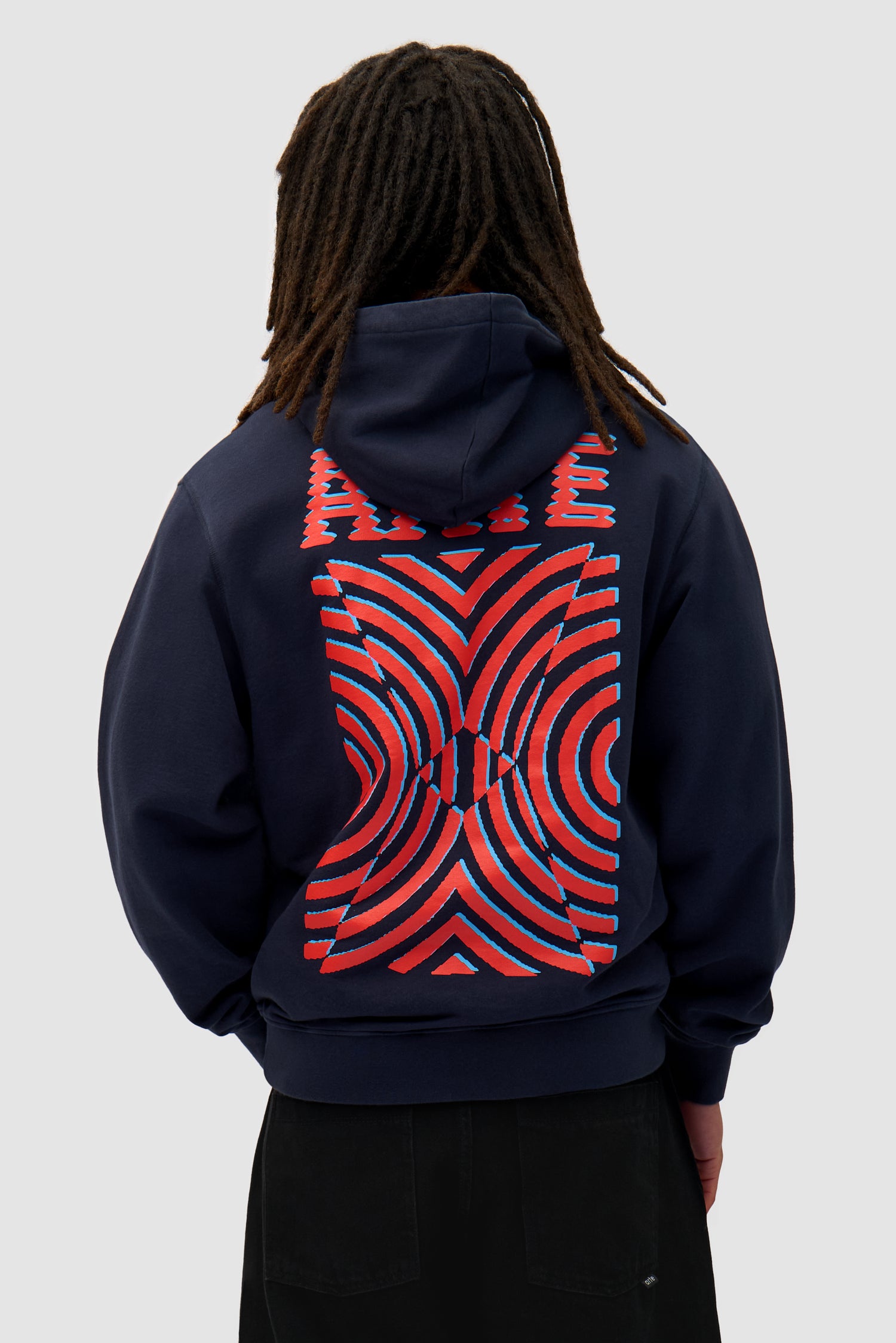 Mural Back Print Hoodie in Navy worn by a model, half-body front view