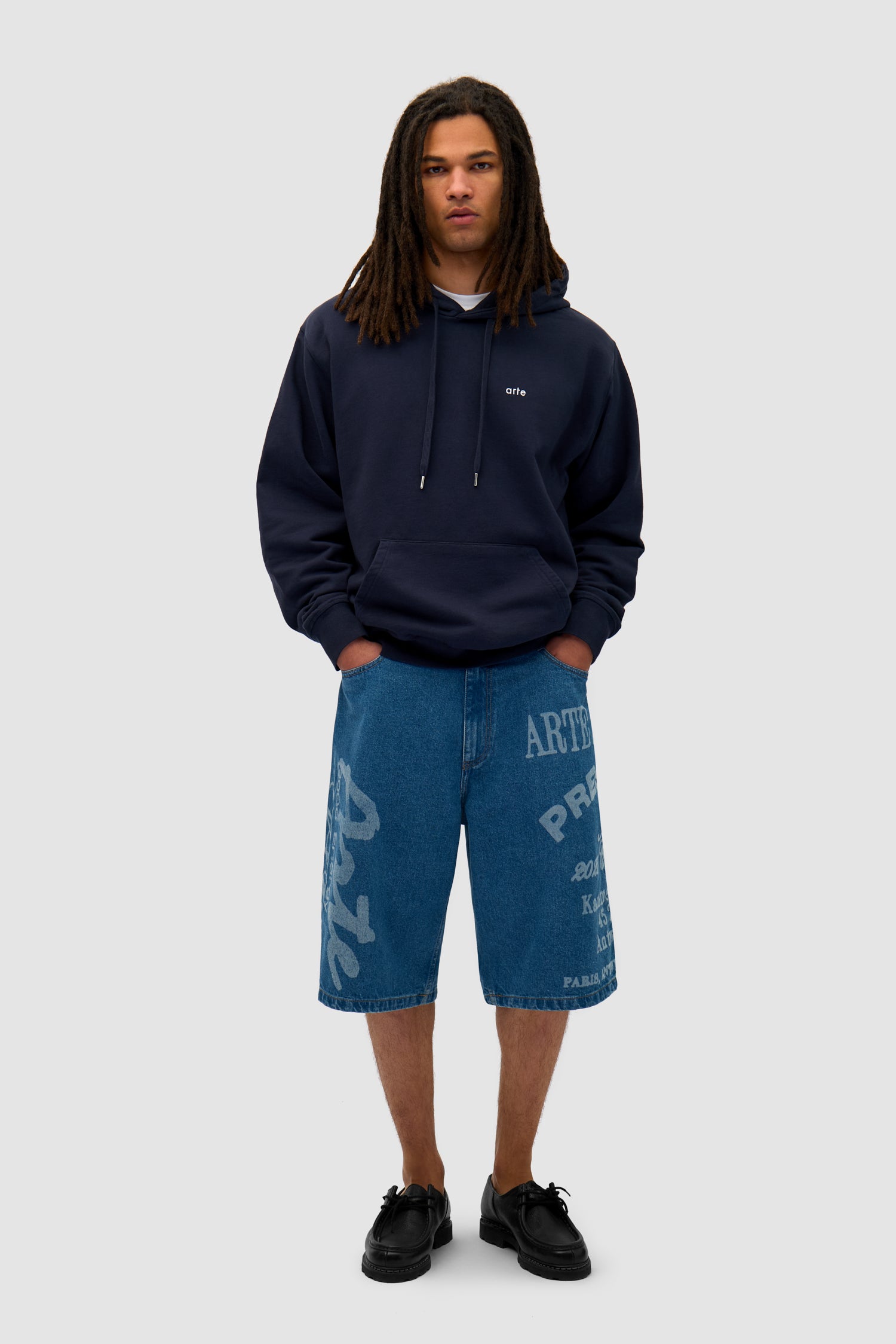 Back Sun & Moon Hoodie in Navy worn by a model, full-body front view