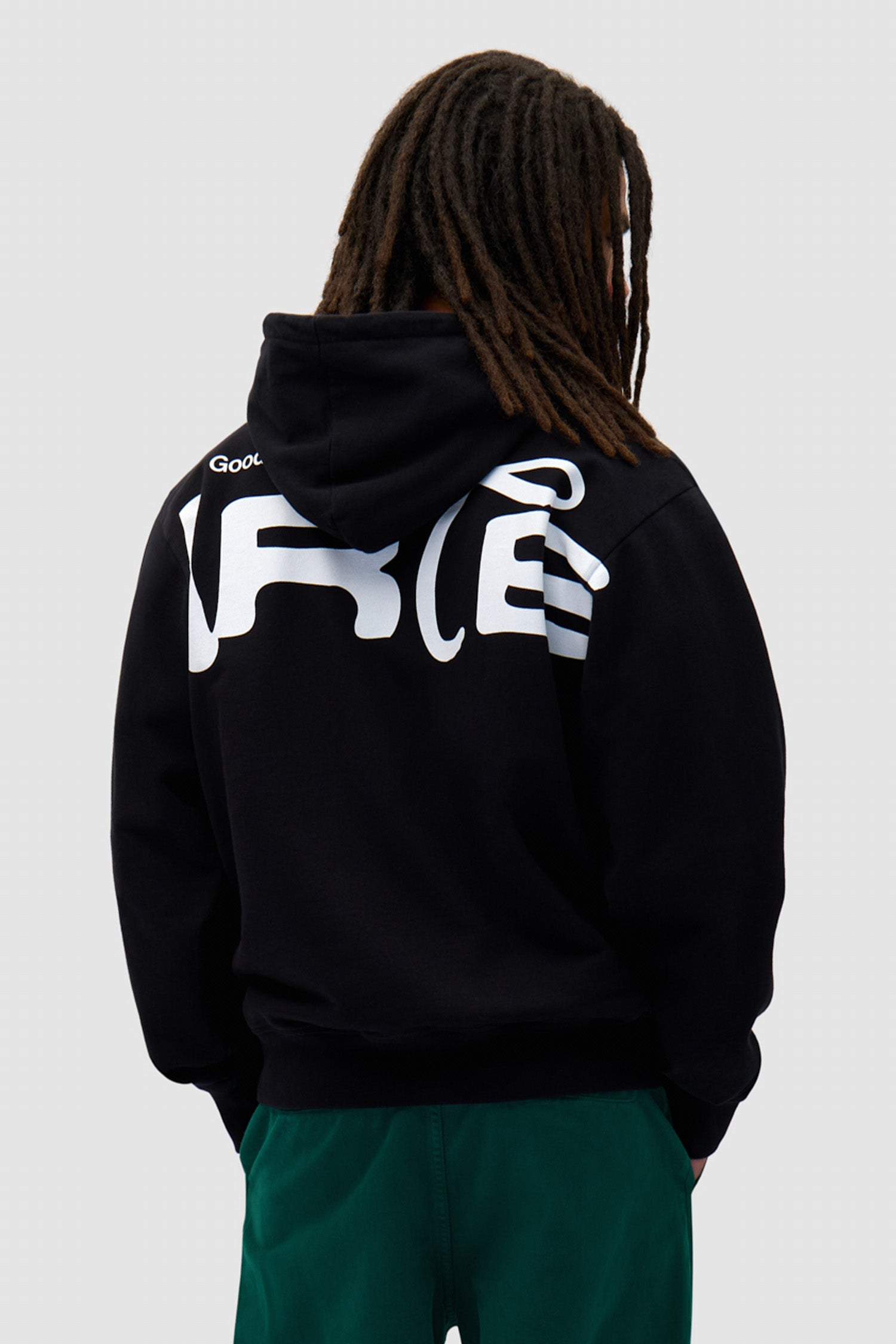 Energy Hoodie in Black worn by a model, half-body front view