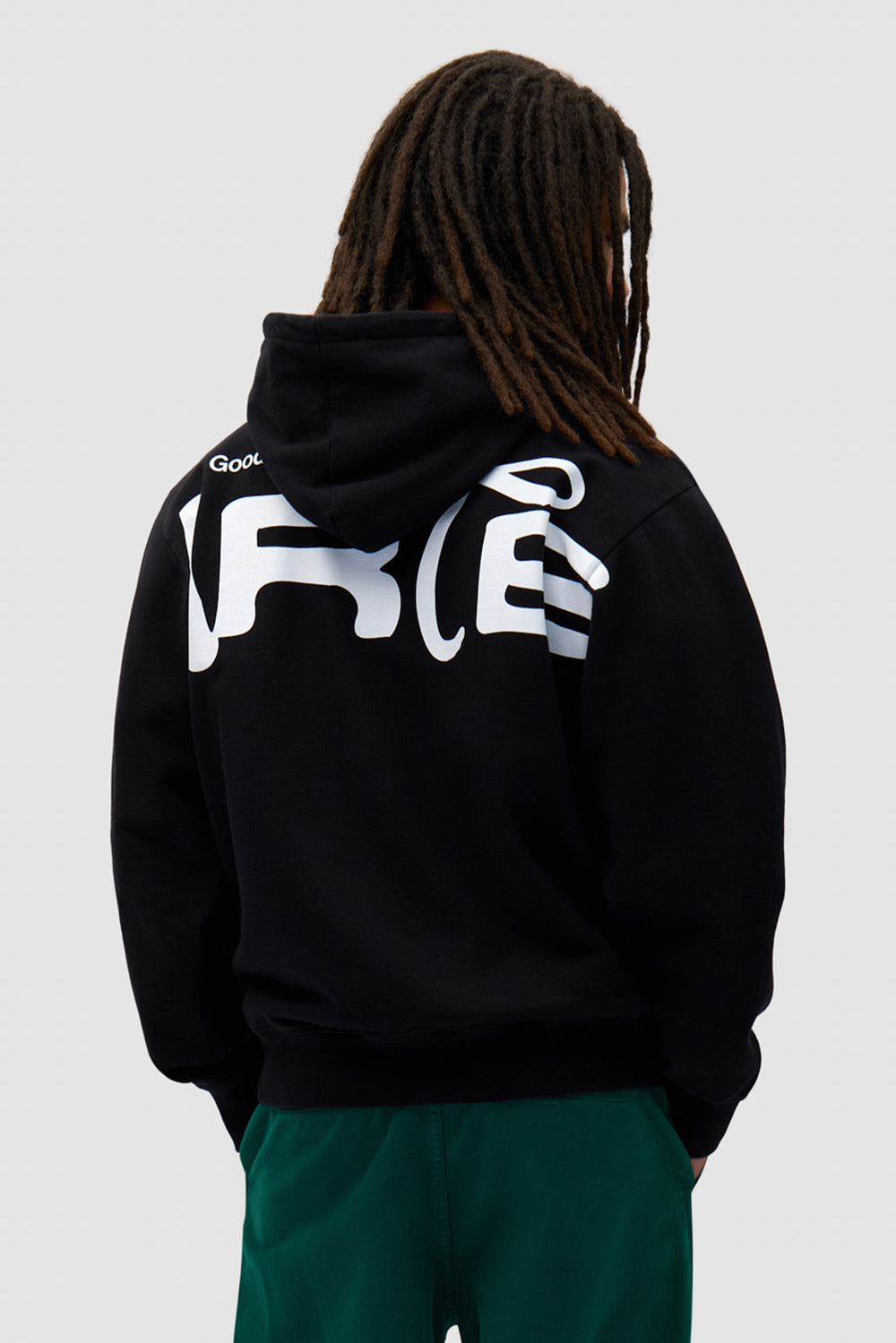 Energy Hoodie in Black worn by a model, half-body front view