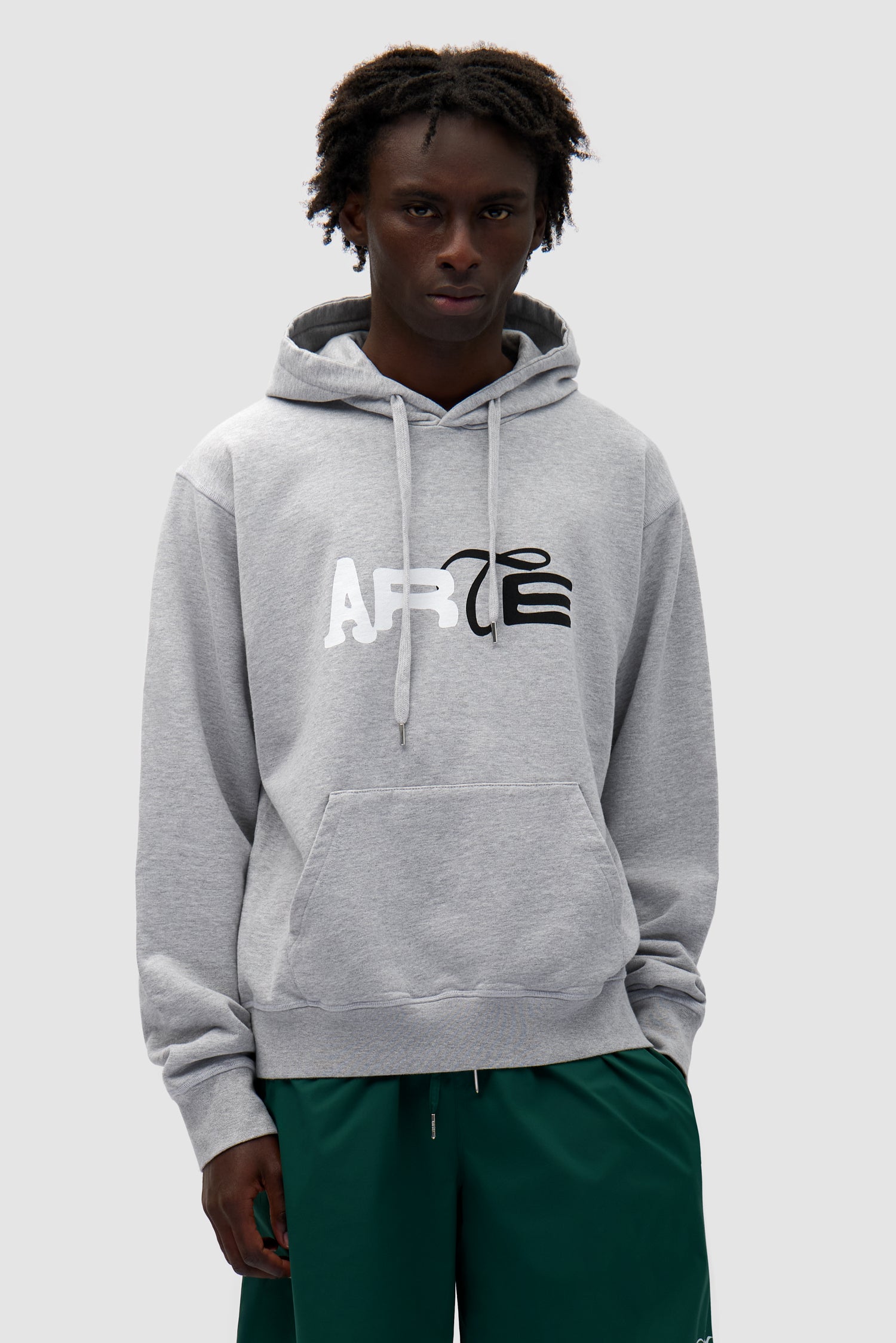 Duo Logo Hoodie in Grey worn by a model, half-body front view